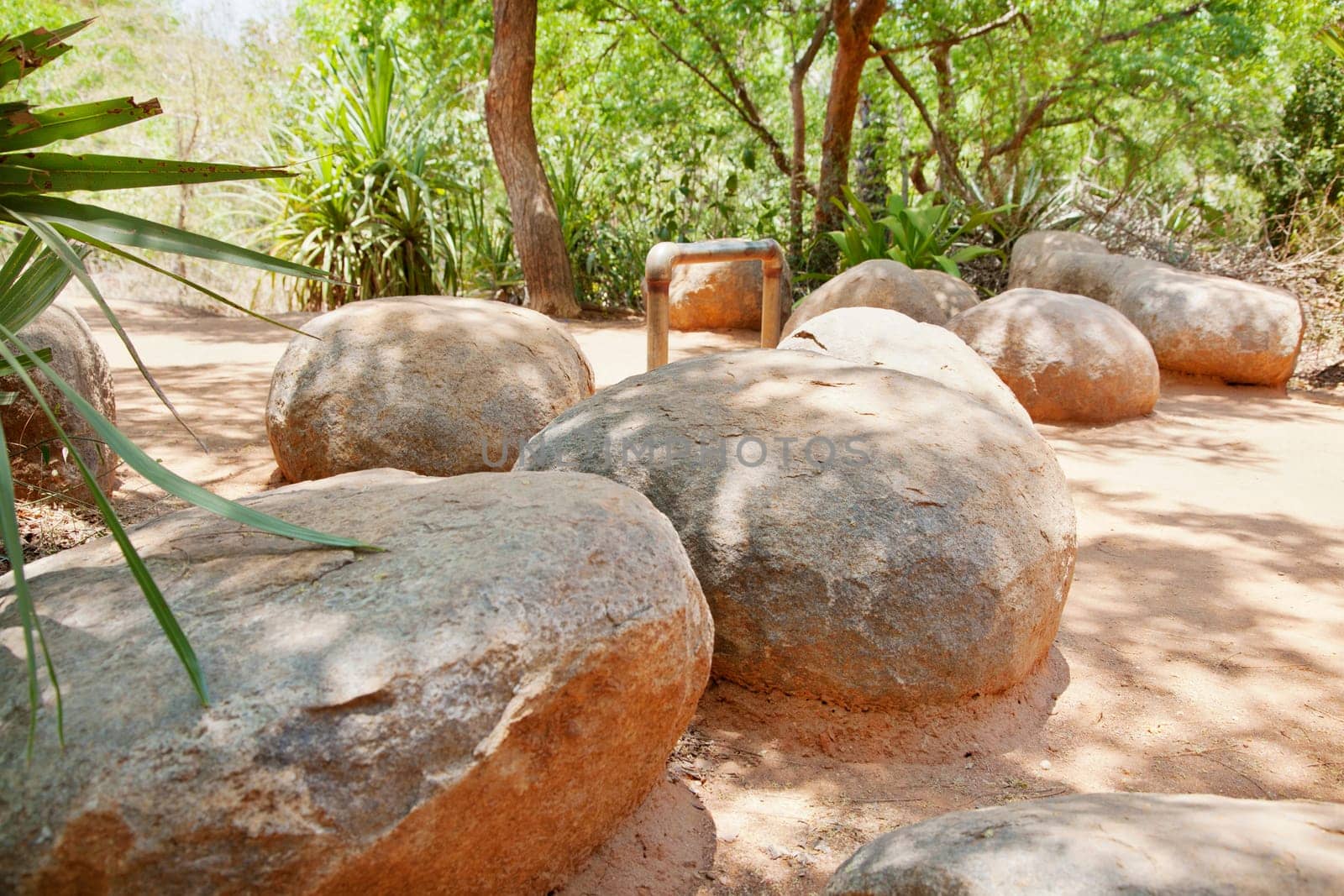 Landscape of the avenue trail leading up to visitors center at Auroville near pondicherry, tamil nadu india. Strategic boulders and bars prevent cyclists cyclist from entry