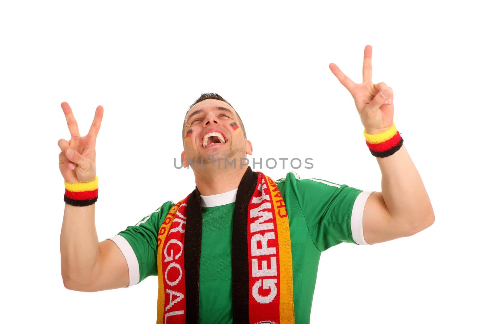 The photo shows a young football fan making the peace sign and apparently cheering