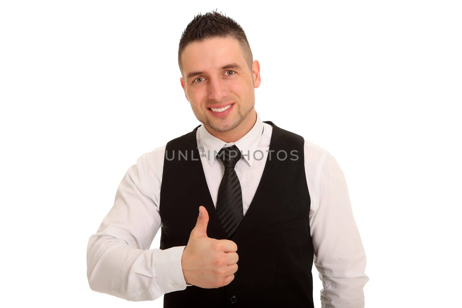 Portrait photo of young businessman showing thumbs up and smiling at camera