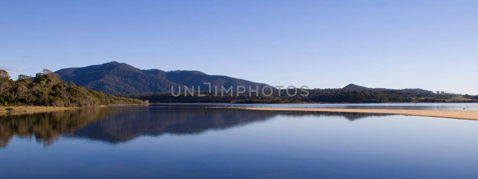 A view from Wallaga Lake to the hills in the background.
