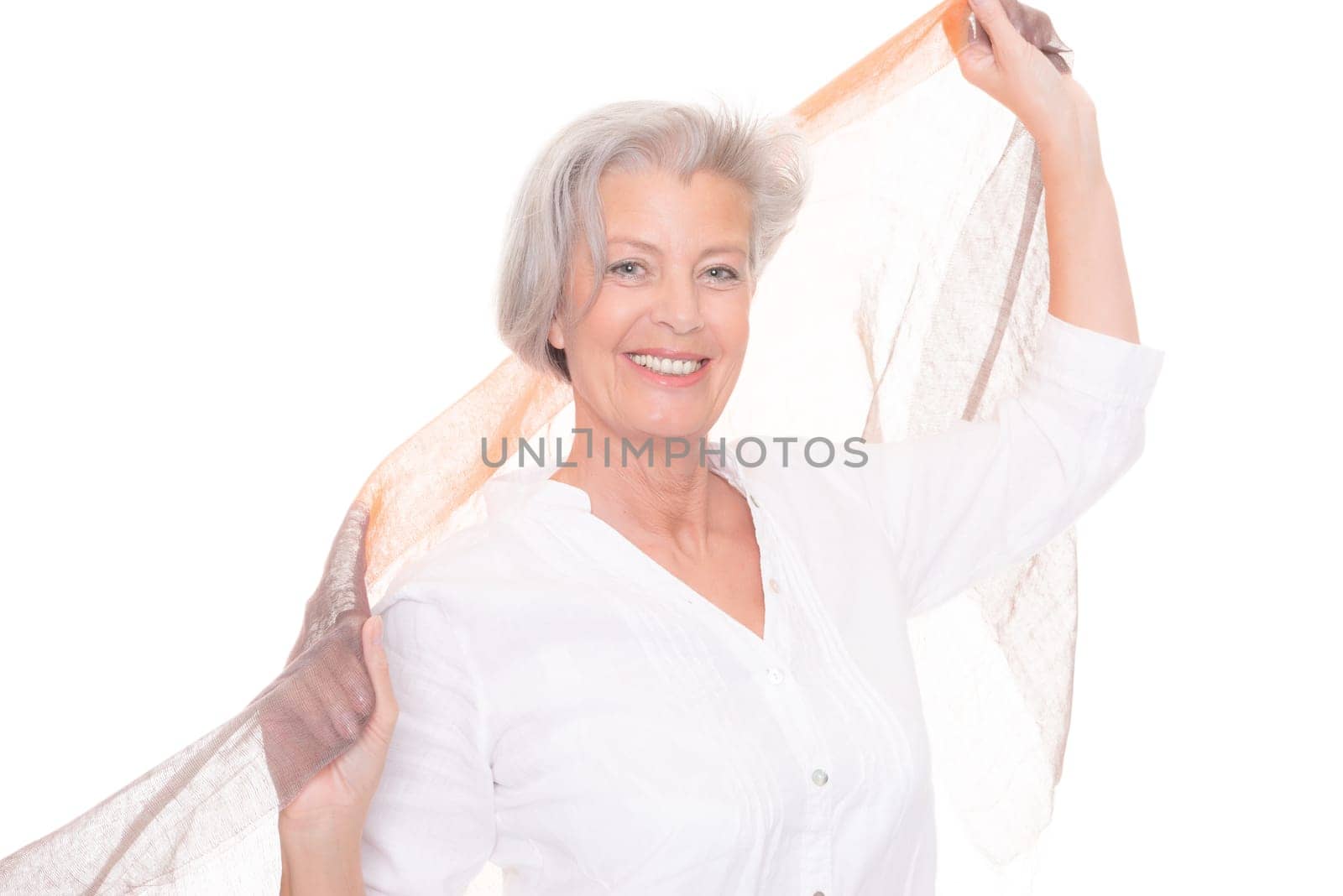 Happy senior woman with a cloth against a white background