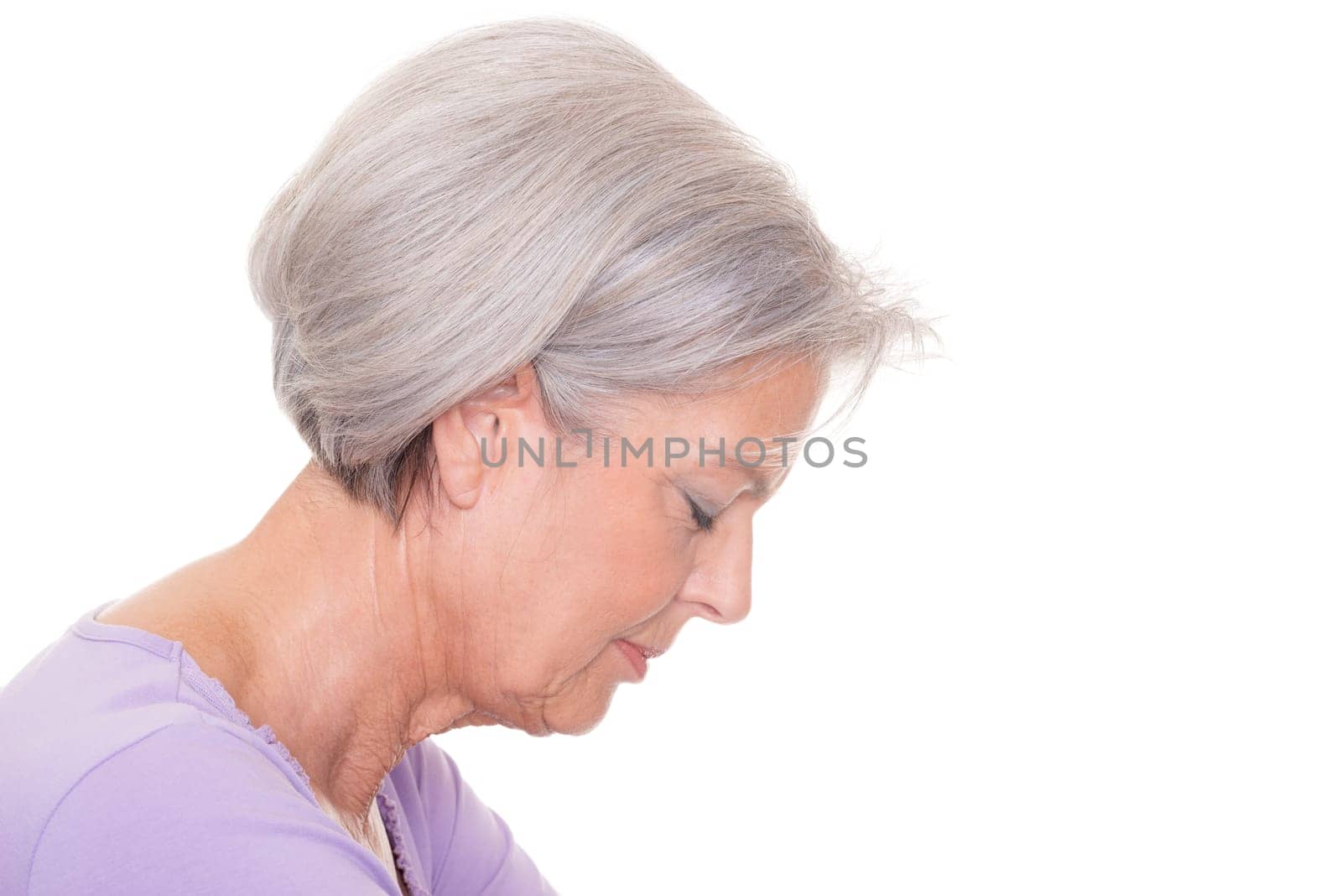 Studio shot of an elderly woman against a white background