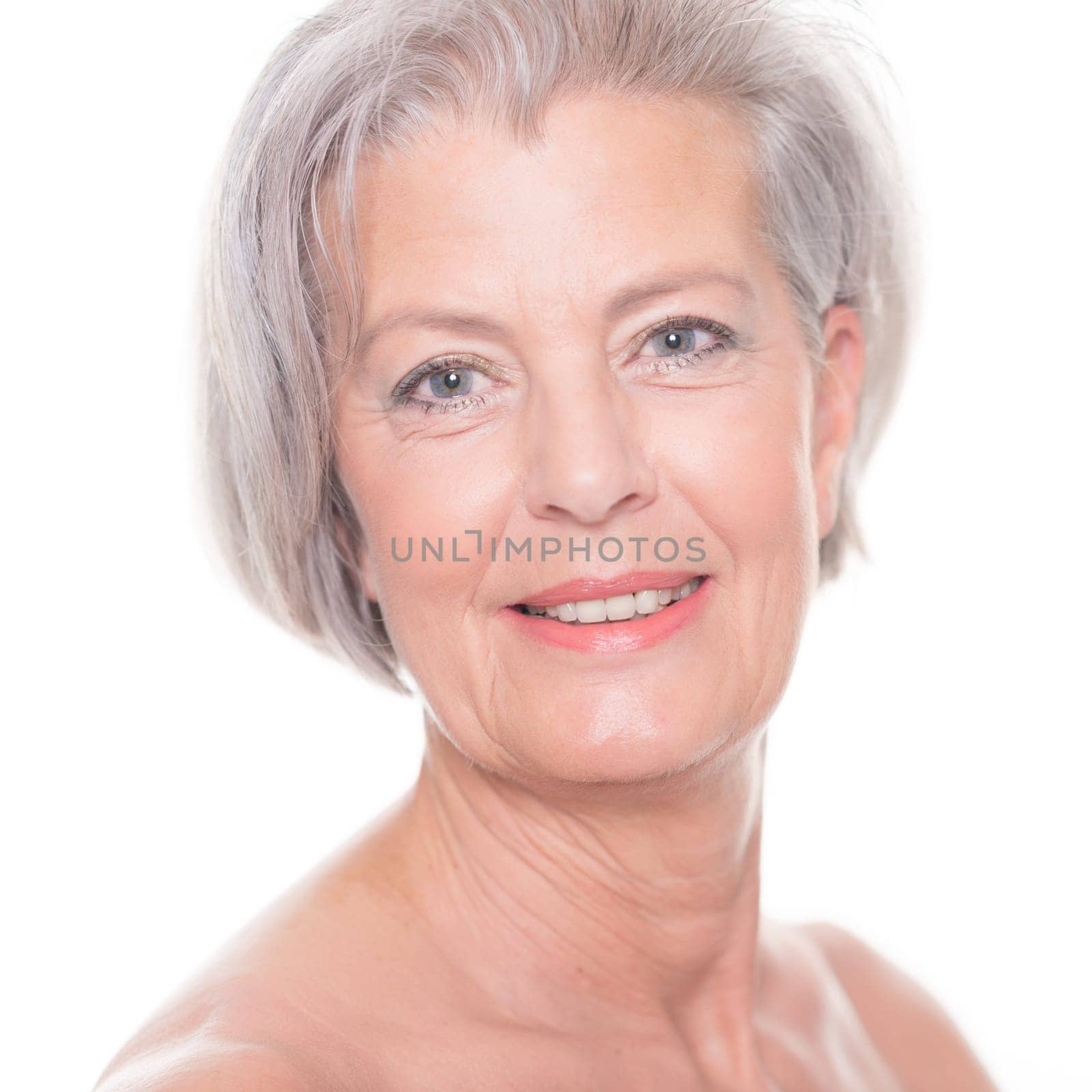 Studio shot of an elderly woman against a white background