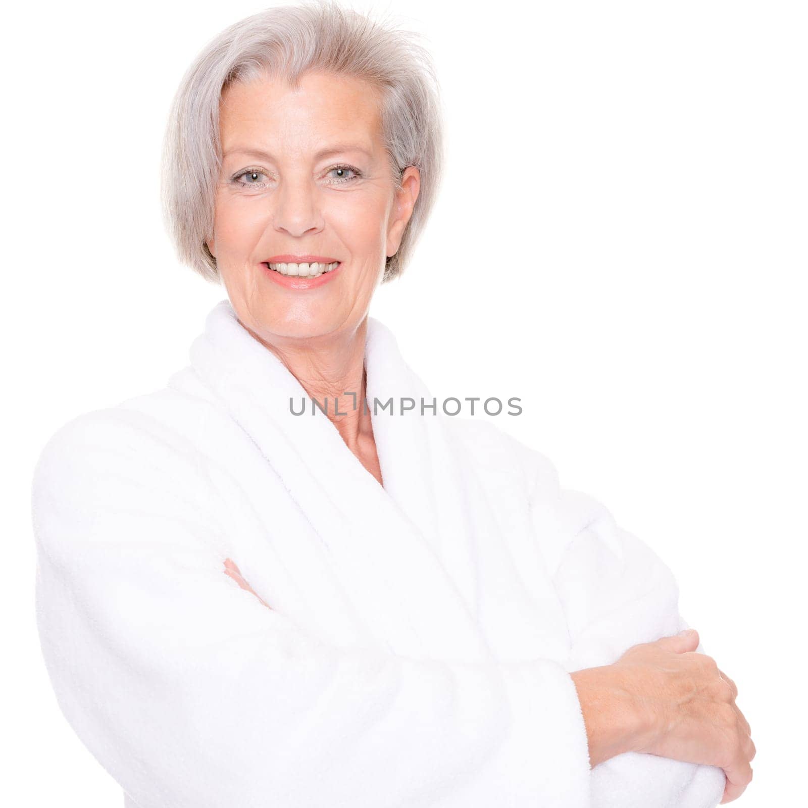 Studio shot of an elderly woman in a white bathrobe