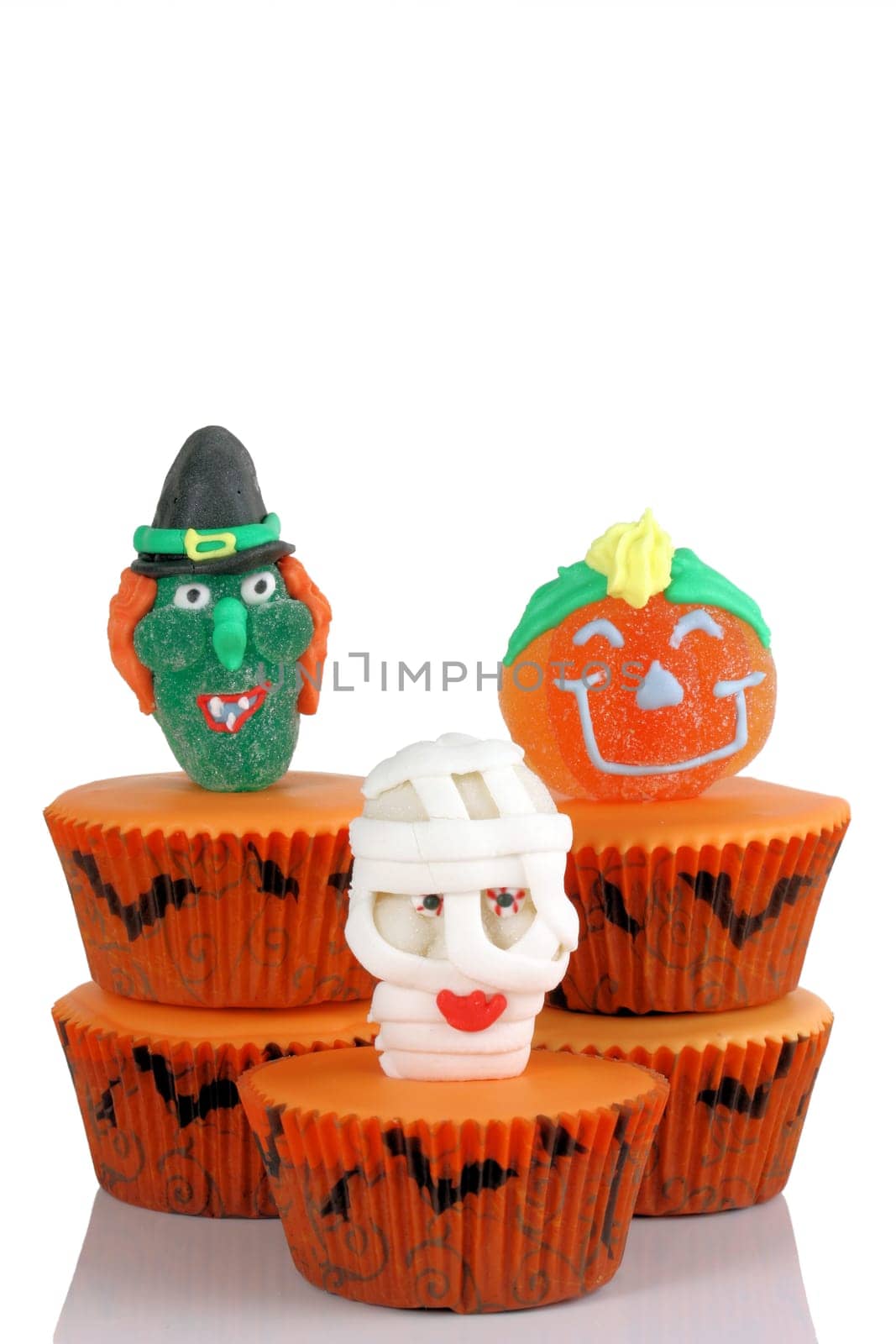 Scary cup cakes on white background