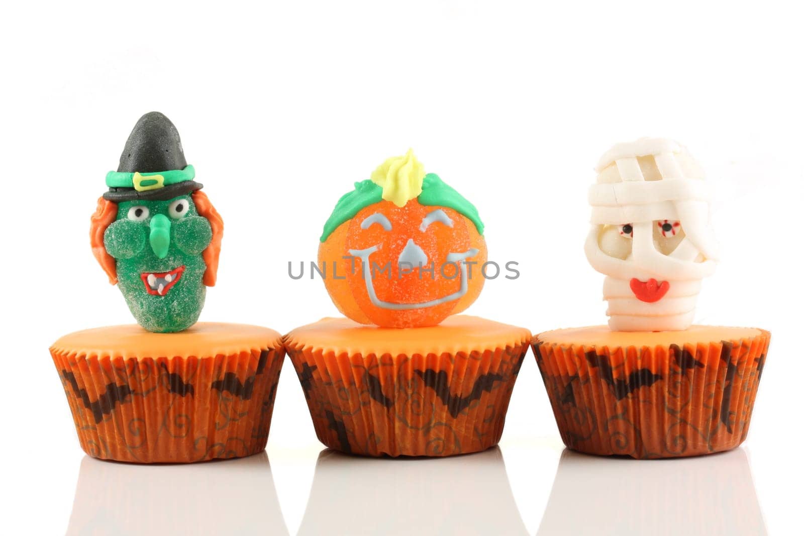 Spooks cup cakes on white background