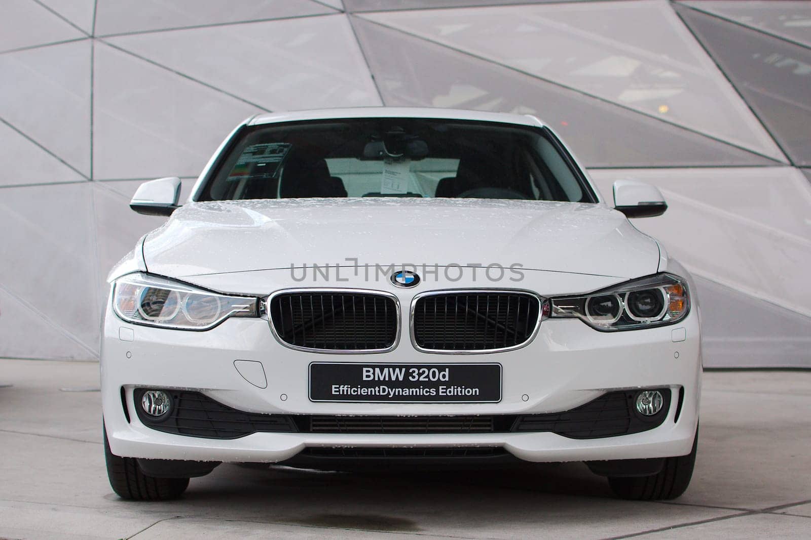MUNICH - SEPTEMBER 19: New model BMW 320d EfficientDynamics at BMW Welt Expo center on September 19, 2012 in Munich