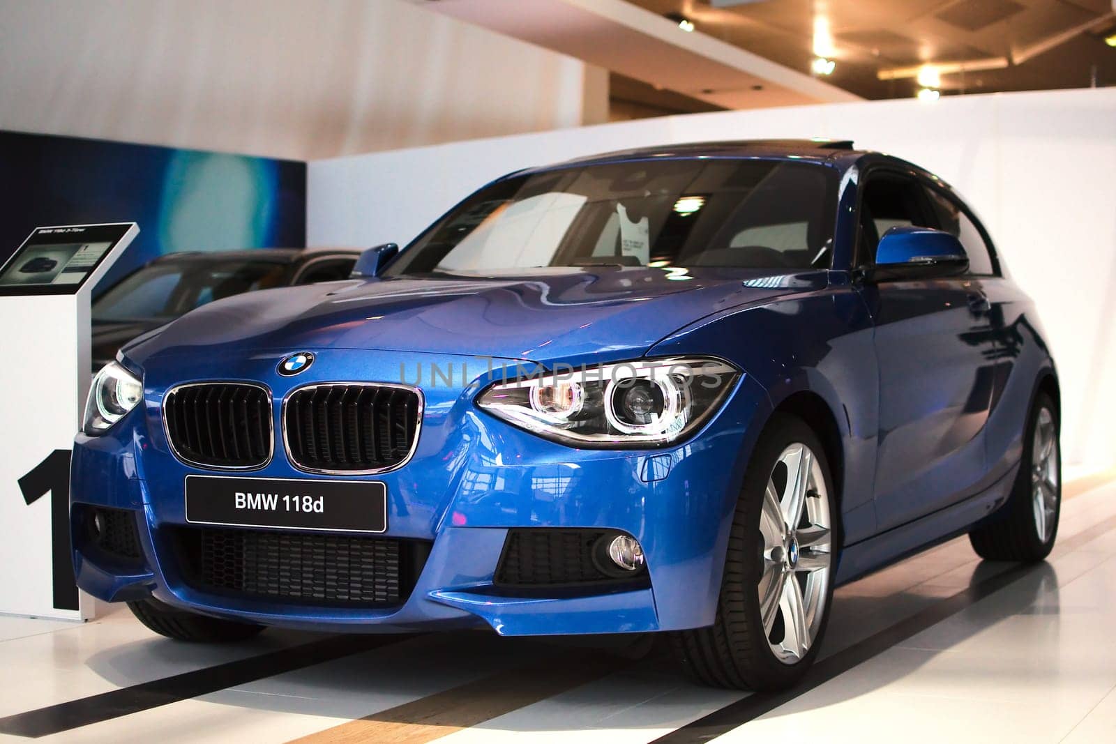 MUNICH - SEPTEMBER 19: New model BMW 118d at BMW Welt Expo center on September 19, 2012 in Munich