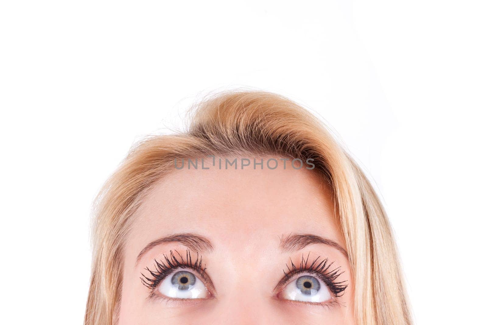 Young  beautiful caucasian  teenage girl looking up, isolated on white background - Caucasian people