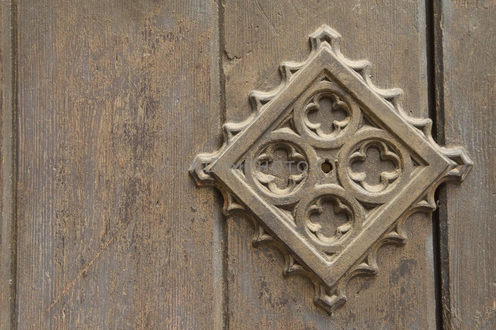 Old metal medieval door background. With a key lock on the left side