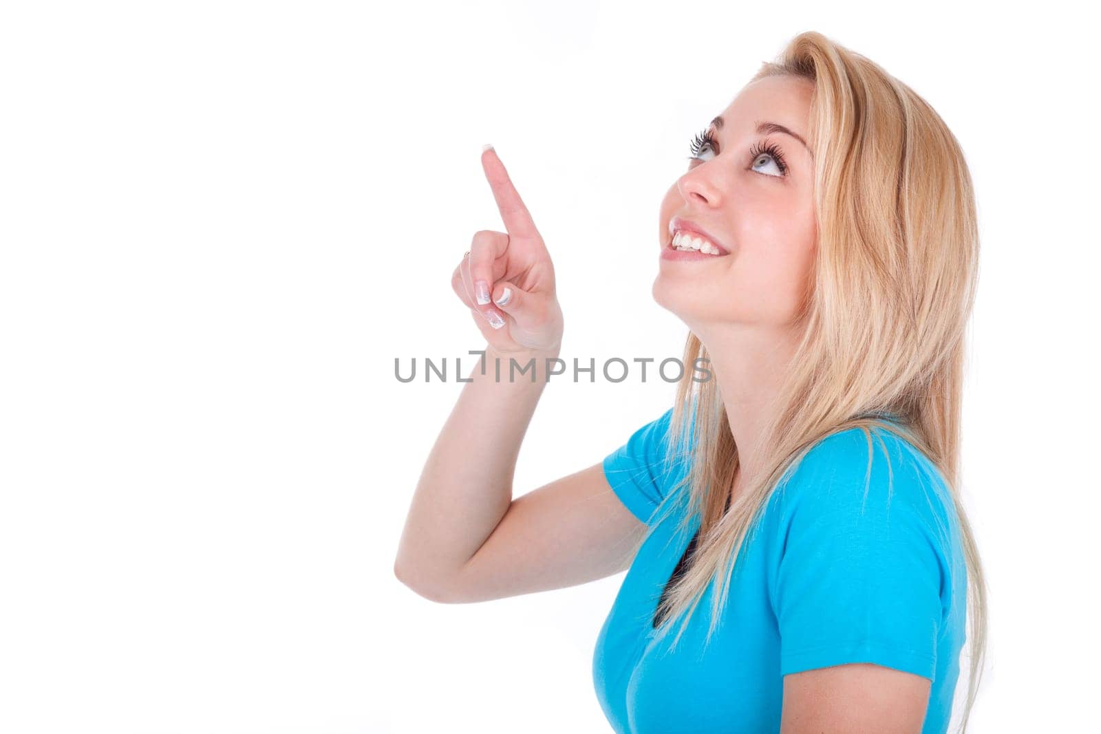 Young  beautiful caucasian  teenage girl looking up, isolated on white background - Caucasian people