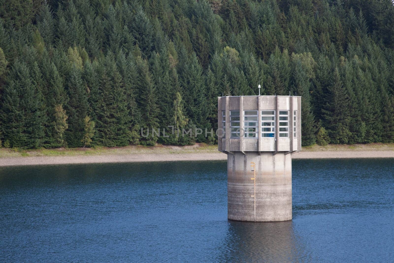 Extraction tower dam toll house