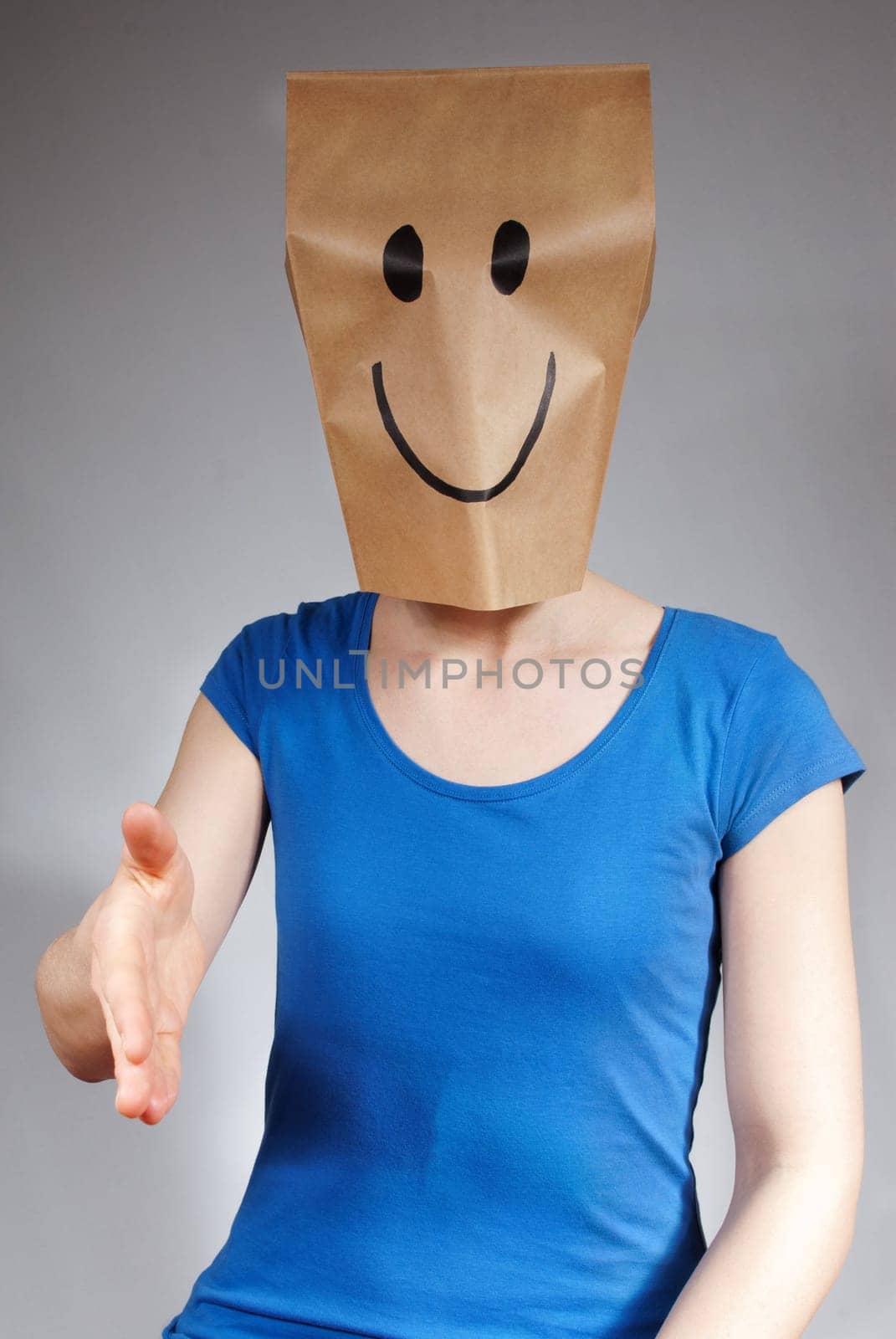 a happy person doing a handshake gesture, gray background