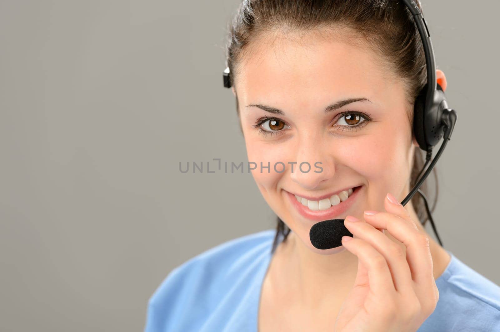 Friendly support phone operator woman wearing headset