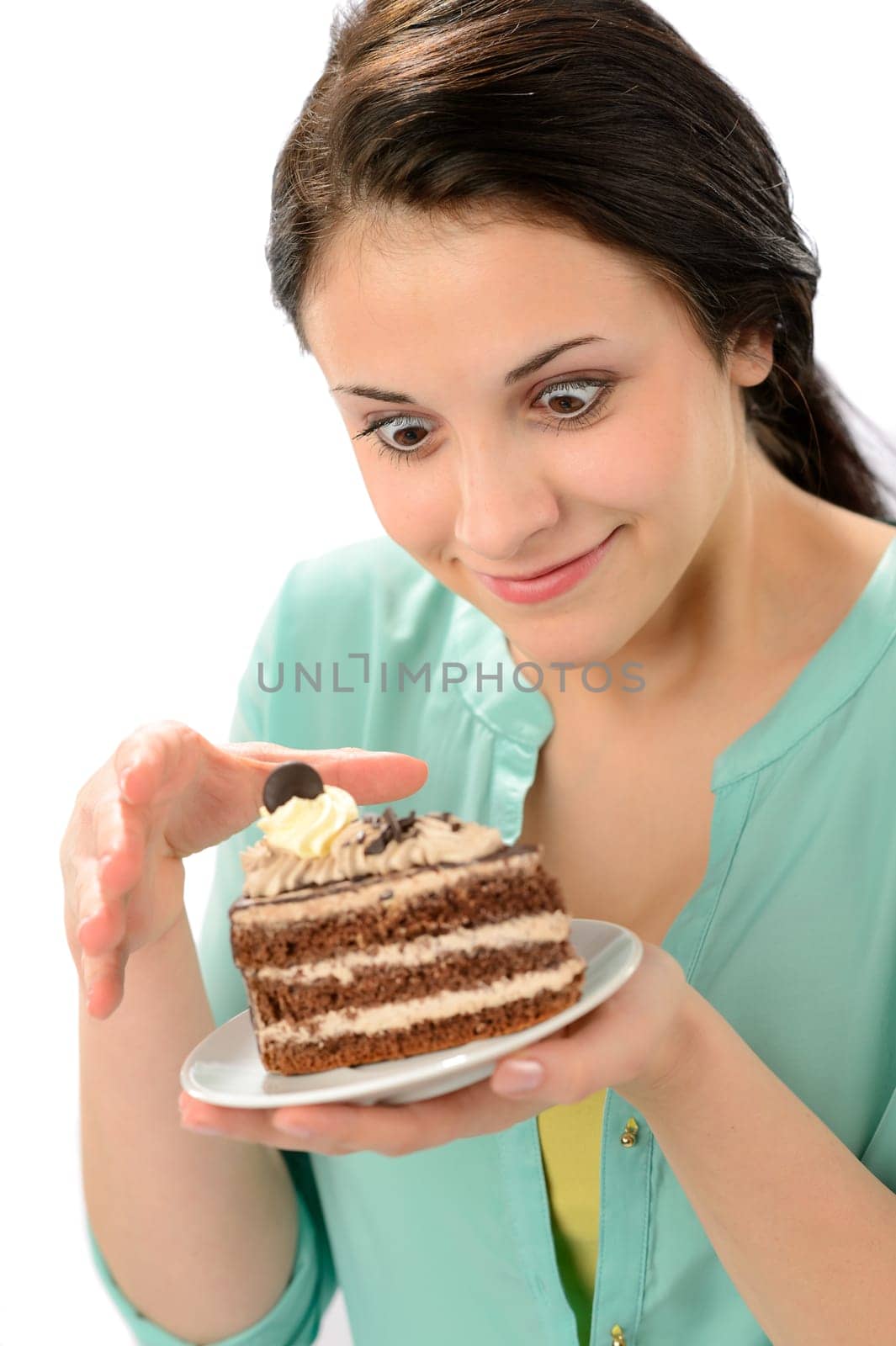 Tempting sweet piece of cake and young hungry woman