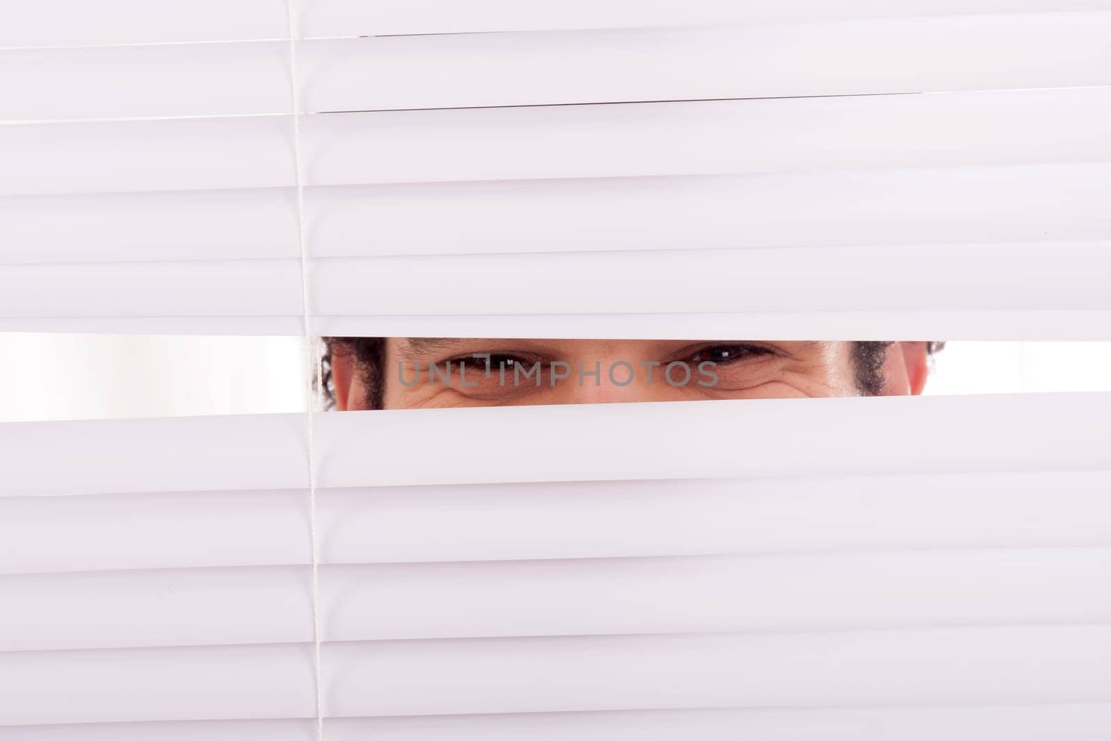 hands apart on the window blindshands apart