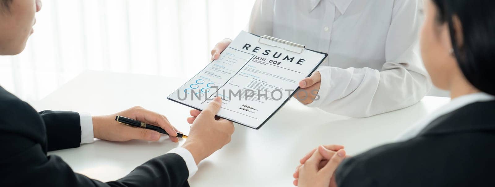 Corporate recruiter interview job applicant to discuss career goal and assess resume and experience. Job interview appointment for career opportunity and HR manager concept. Panorama Shrewd