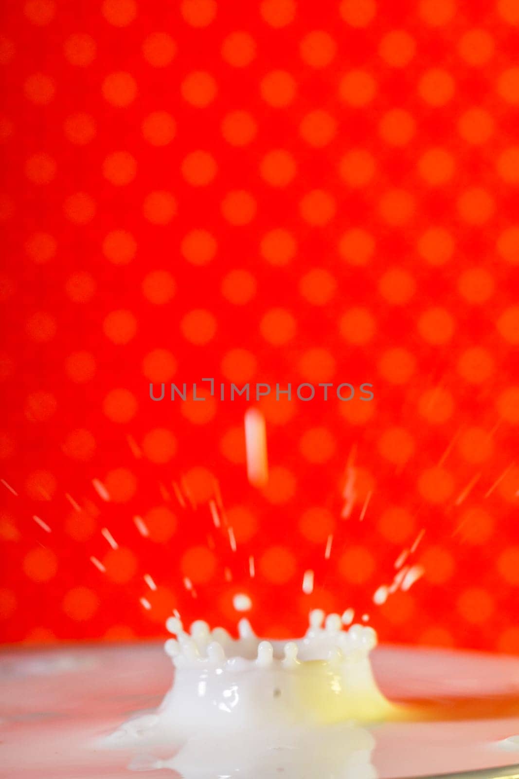 Beautiful close up view of a drop of milk.