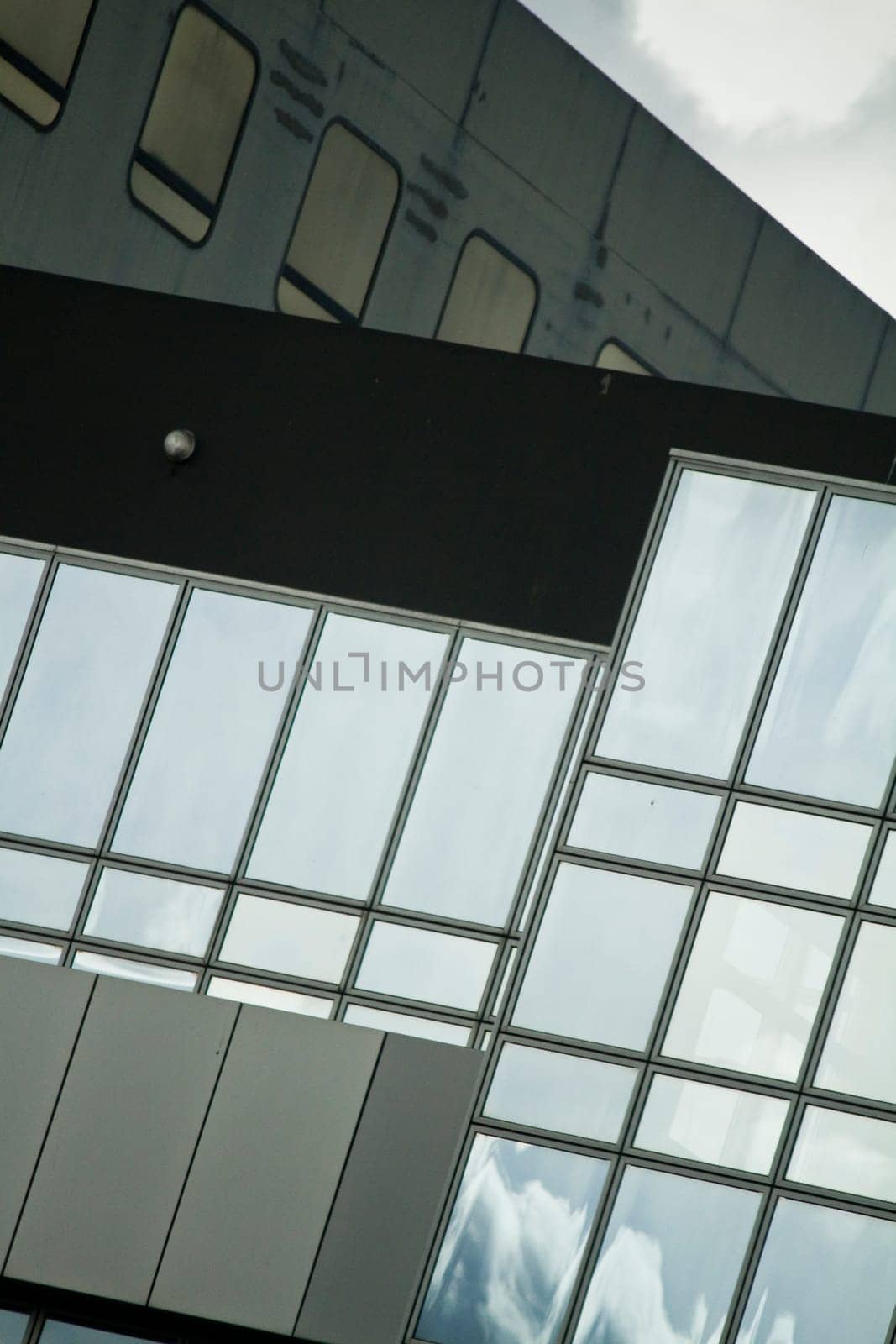 View of a modern and shiny glass skyscraper.