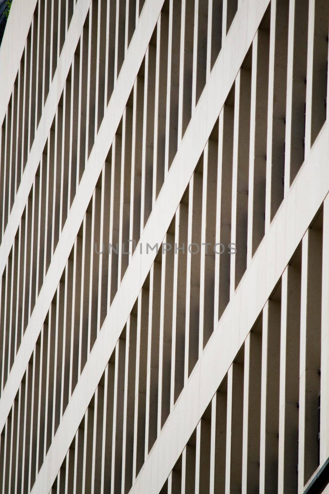 Partial view of a modern skyscraper straight lines.