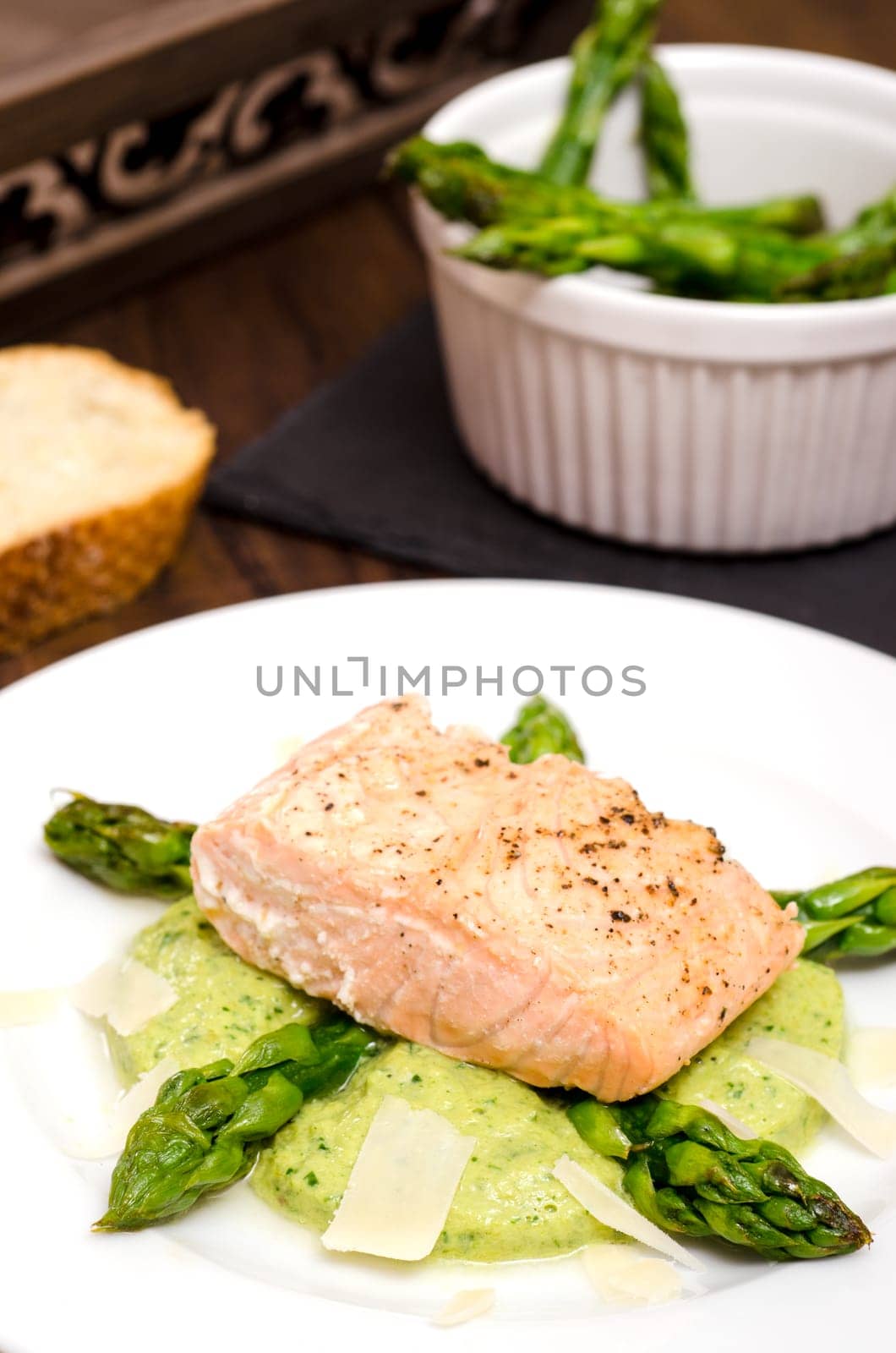 Fried salmon with pepper and green asparagus