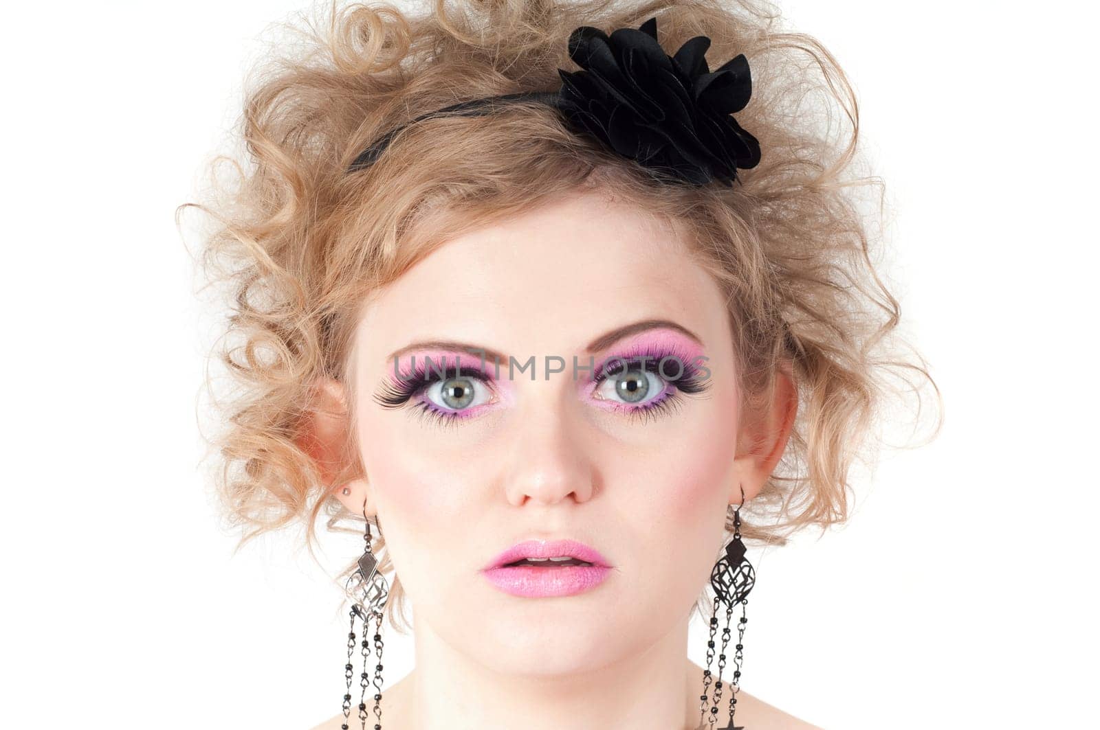 Portrait of young beautiful sexy tender blonde with fancy make-up