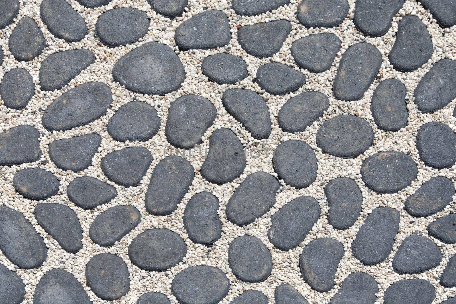 Pedestrian walkway with natural stones