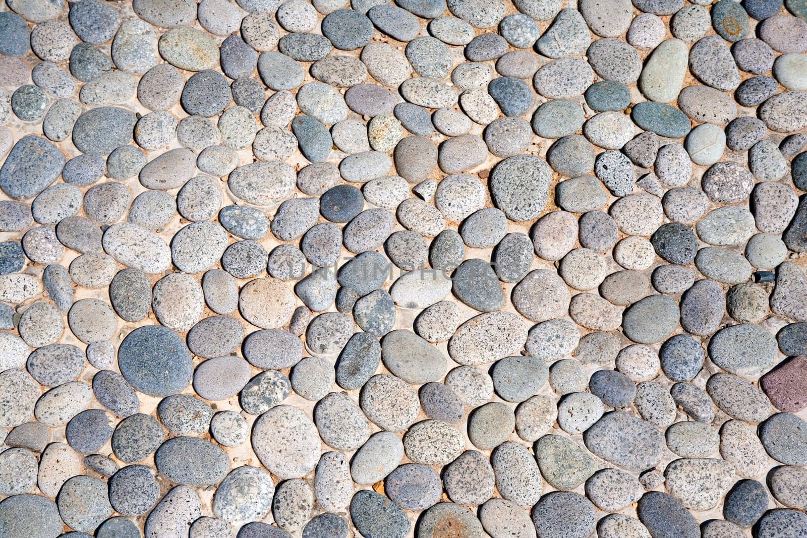 Pedestrian walkway with natural stones