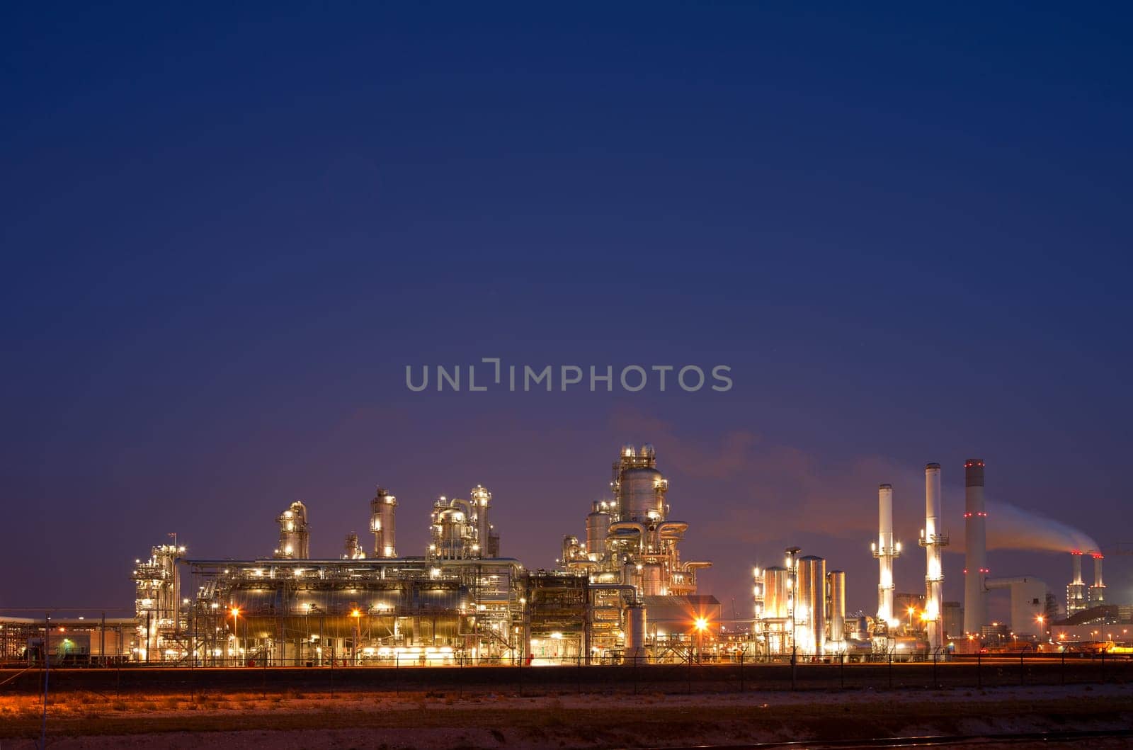 Refinery at night in the Port of Rotterdam, Europoort, Holland