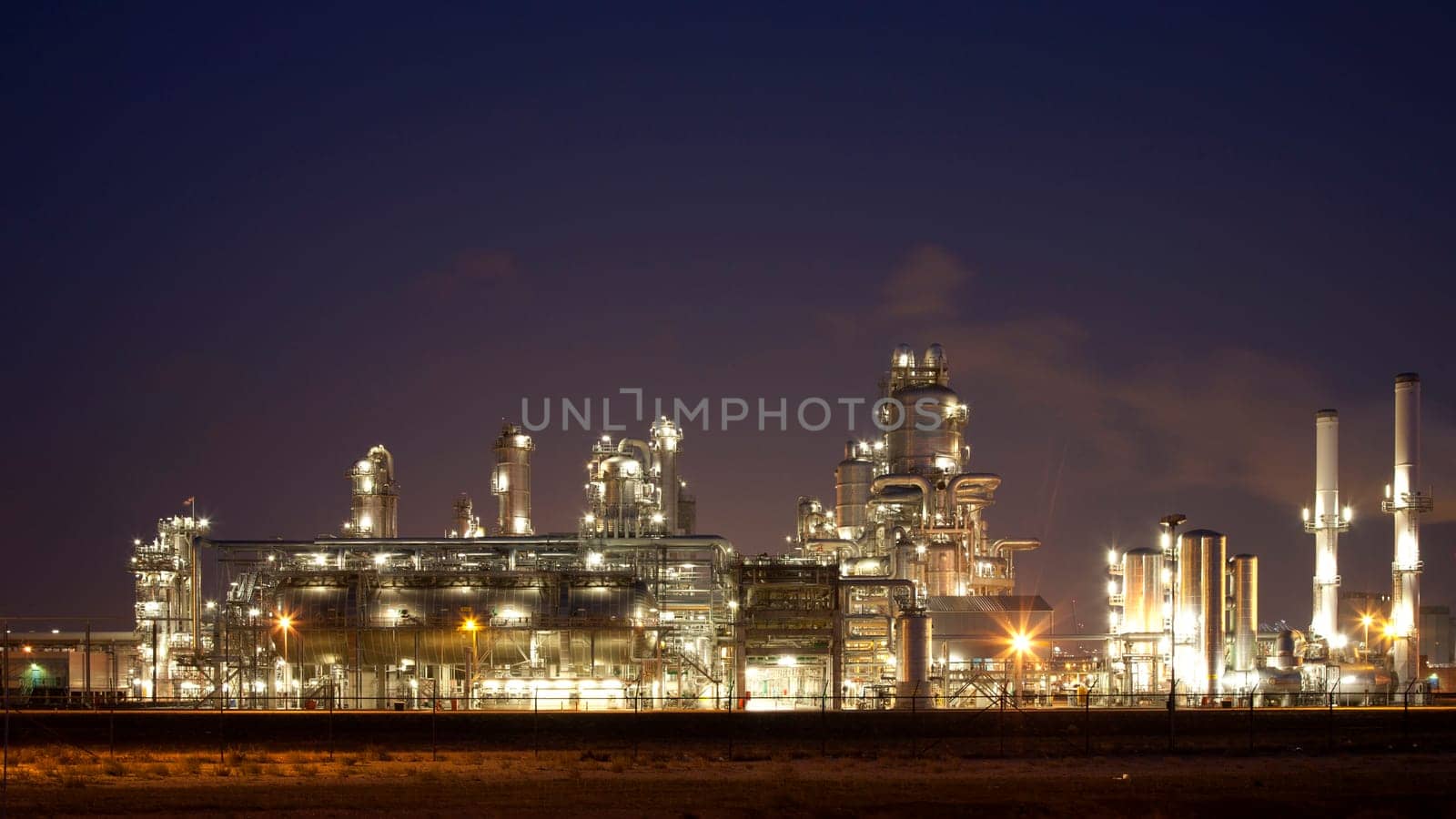 Refinery at night in the Port of Rotterdam, Europoort, Holland