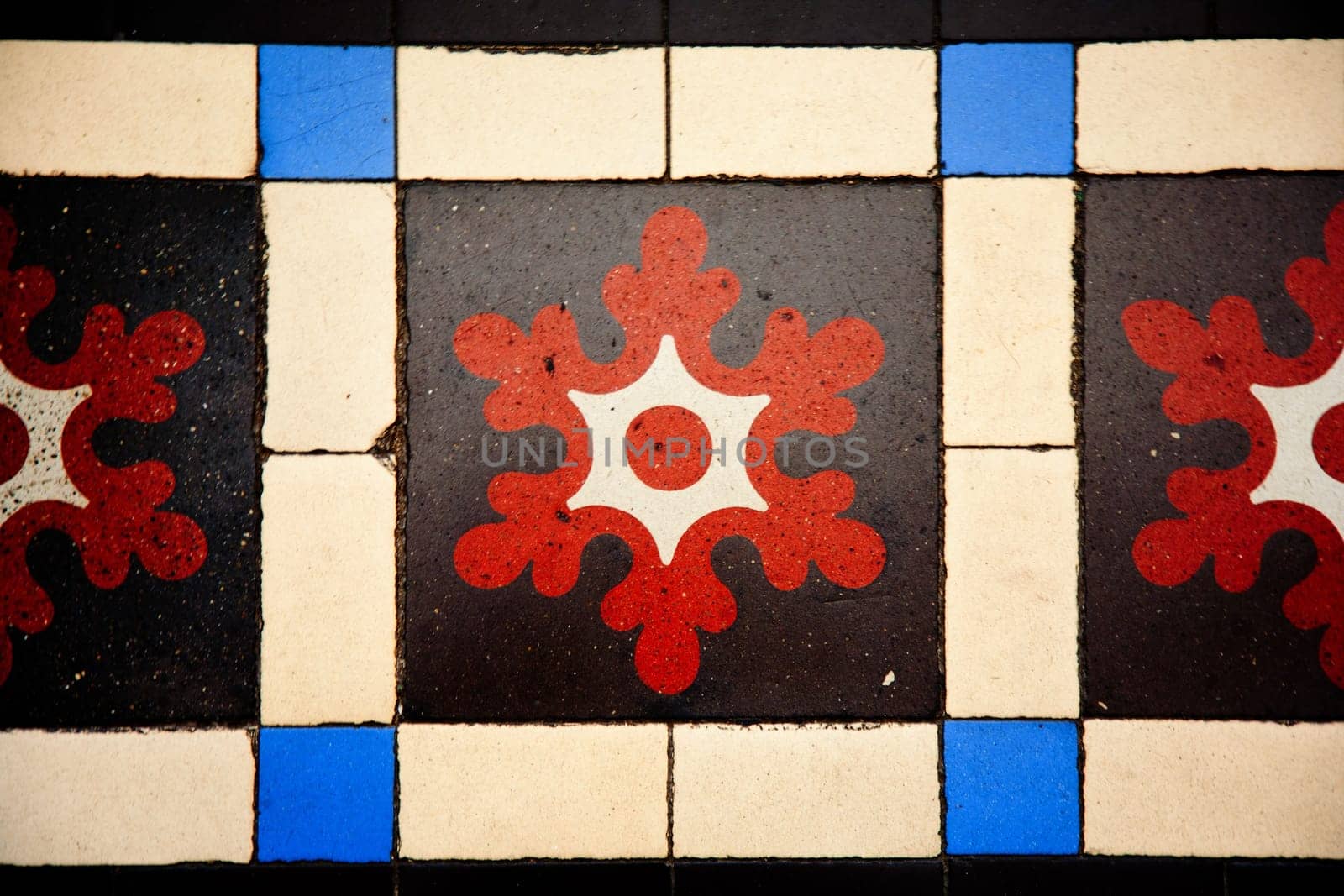 Antique tiles in the interior of the Saigon Central Post Office, Vietnam