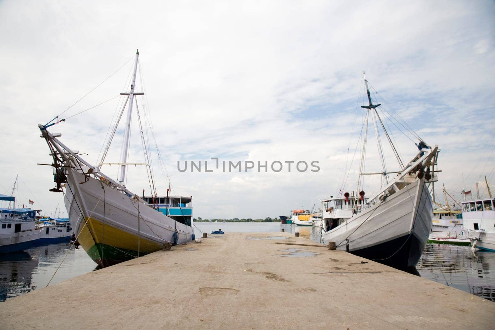 Makassar schooners (pinisi) in Paotere harbor, the old port of Makassar,  Indonesia