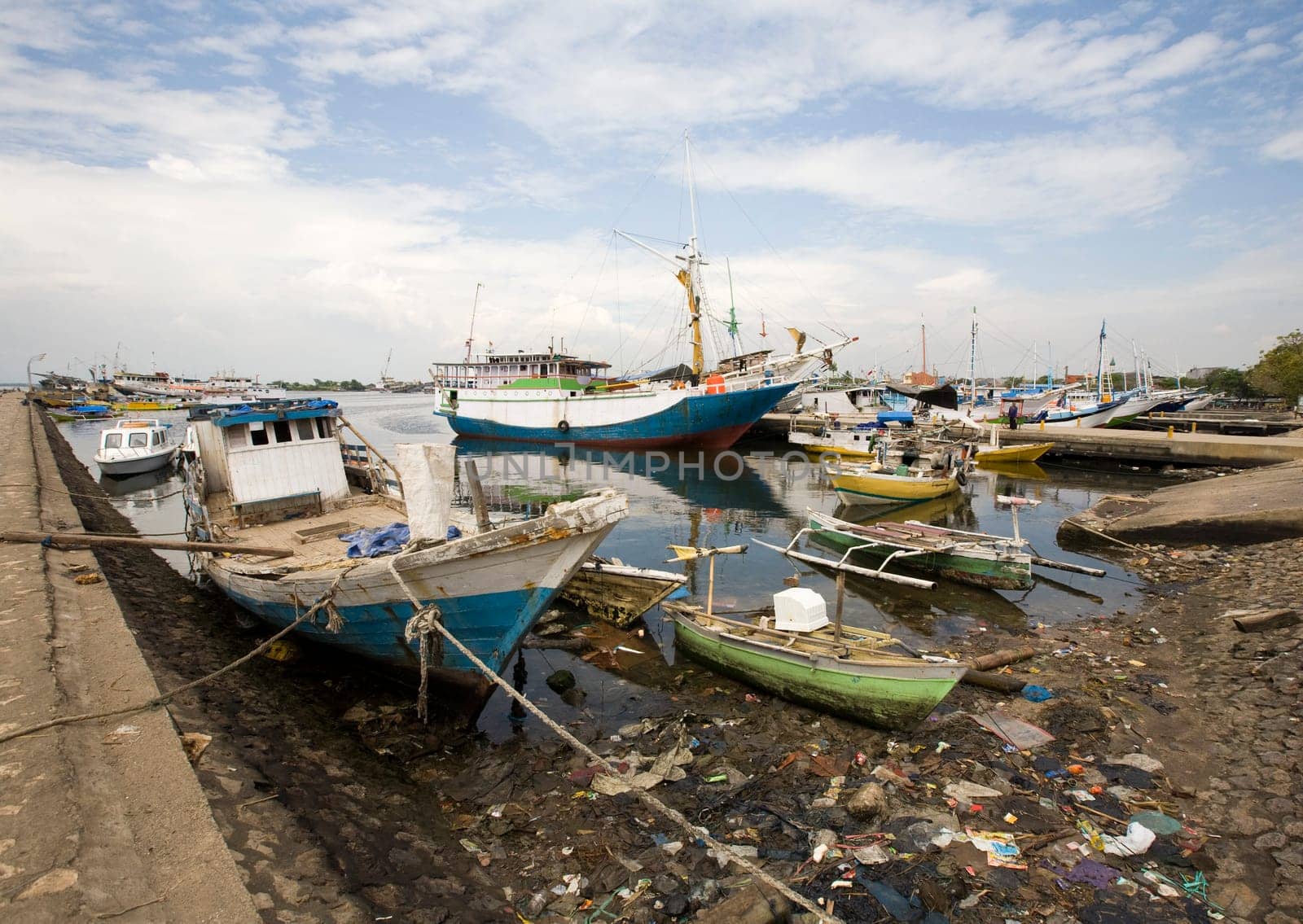 Makassar schooners (pinisi) in Paotere harbor, the old port of Makassar,  Indonesia