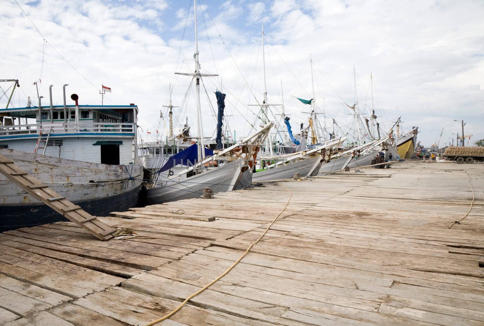 Makassar schooners (pinisi) in Paotere harbor, the old port of Makassar,  Indonesia