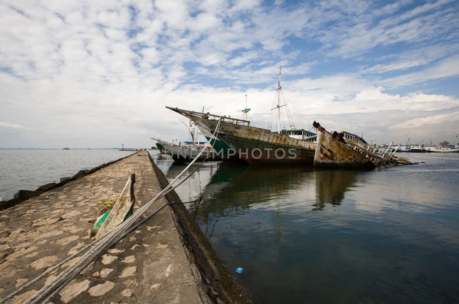 Makassar schooners (pinisi) in Paotere harbor, the old port of Makassar,  Indonesia