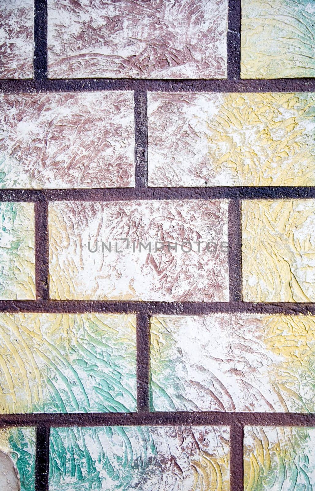 Close up image of a colored stone wall