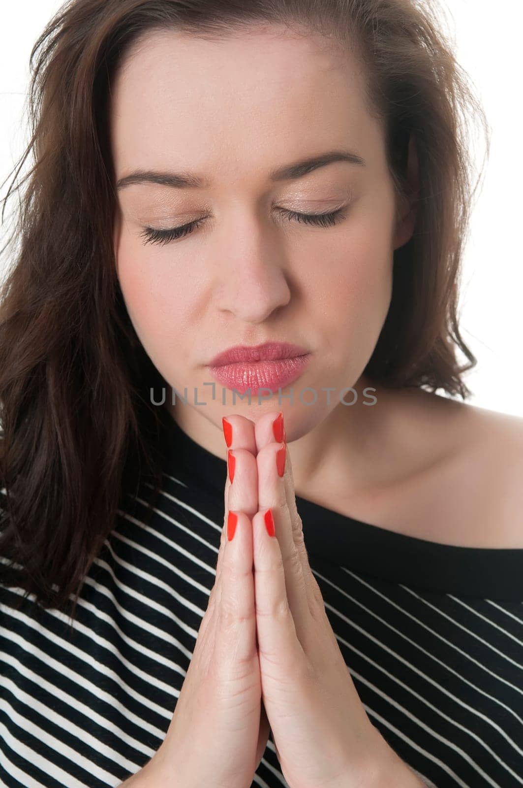 young woman prays