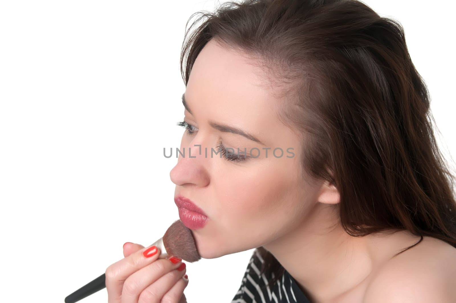 Woman with make-up brush