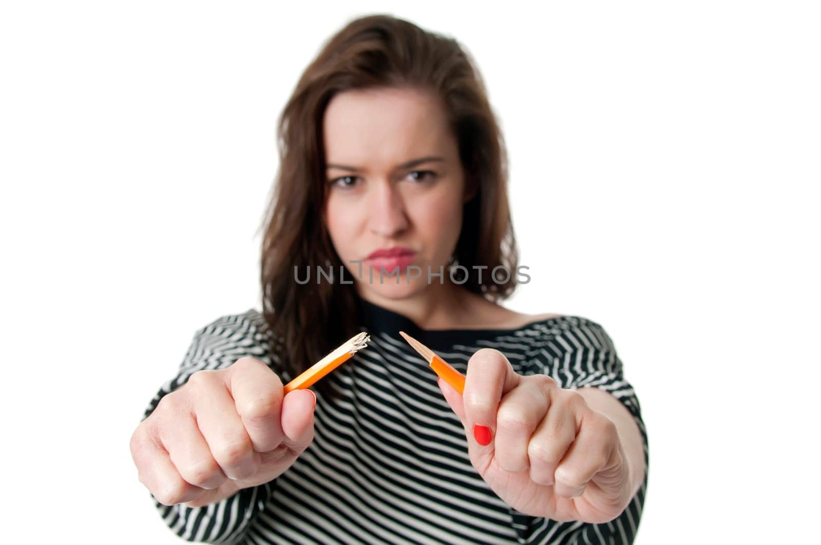Woman breaks pencil
