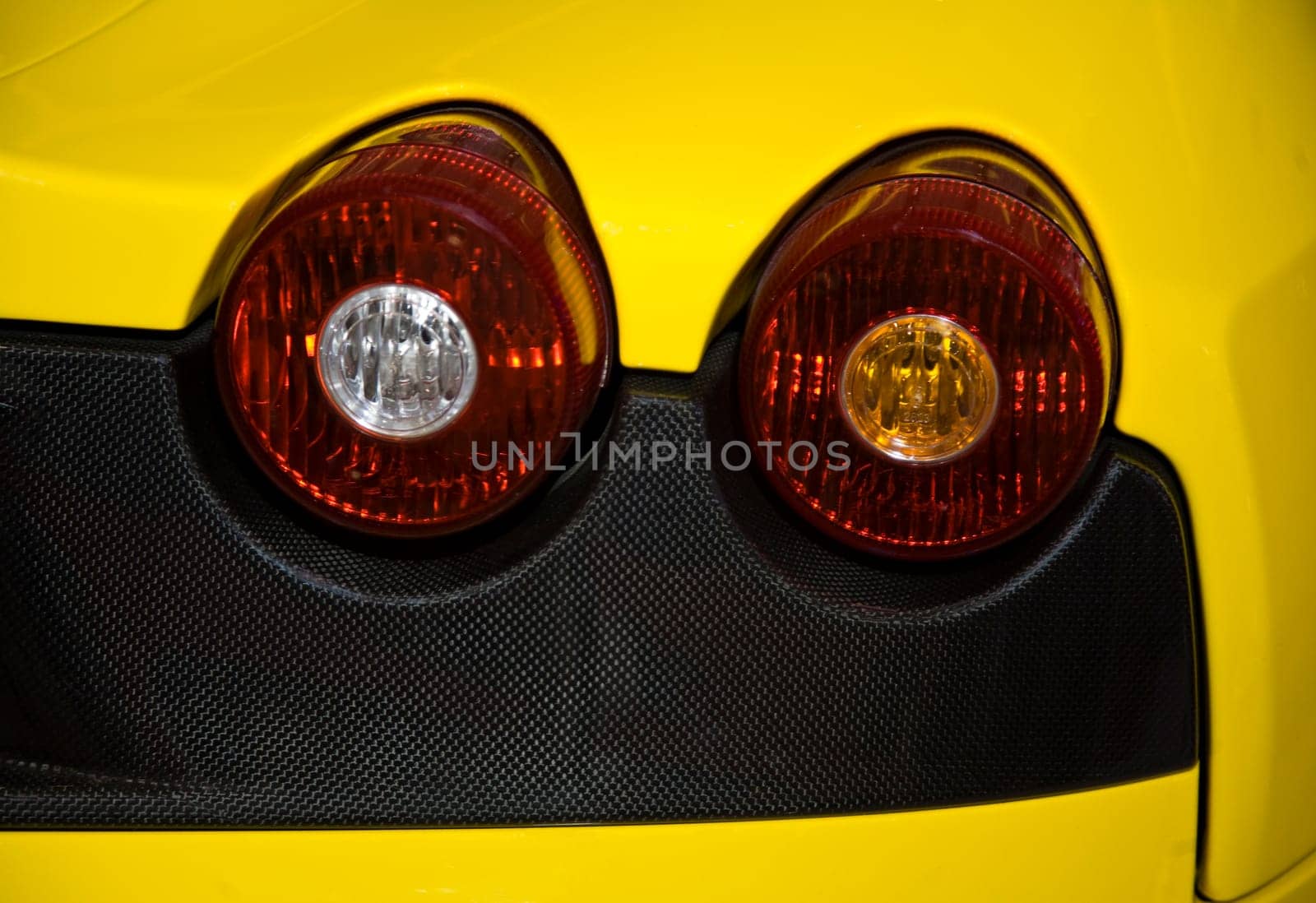 Backlights of a yellow sport car