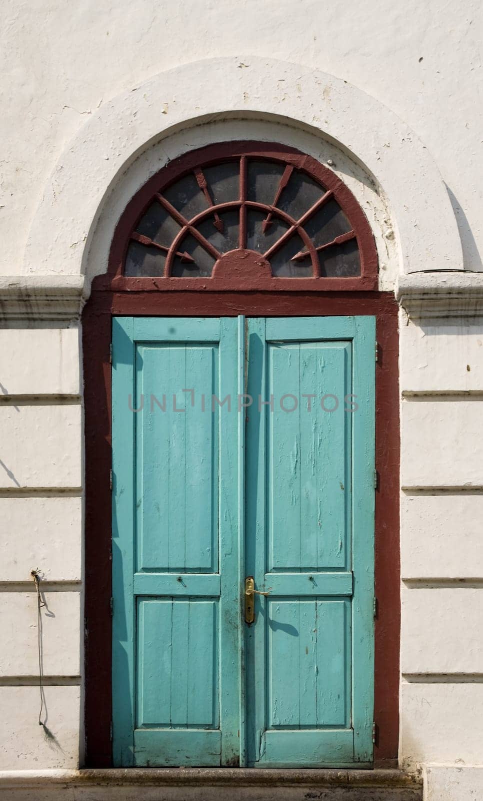 Traditional Dutch colonial door in an old VOC warehouse in Jakarta, Indonesia