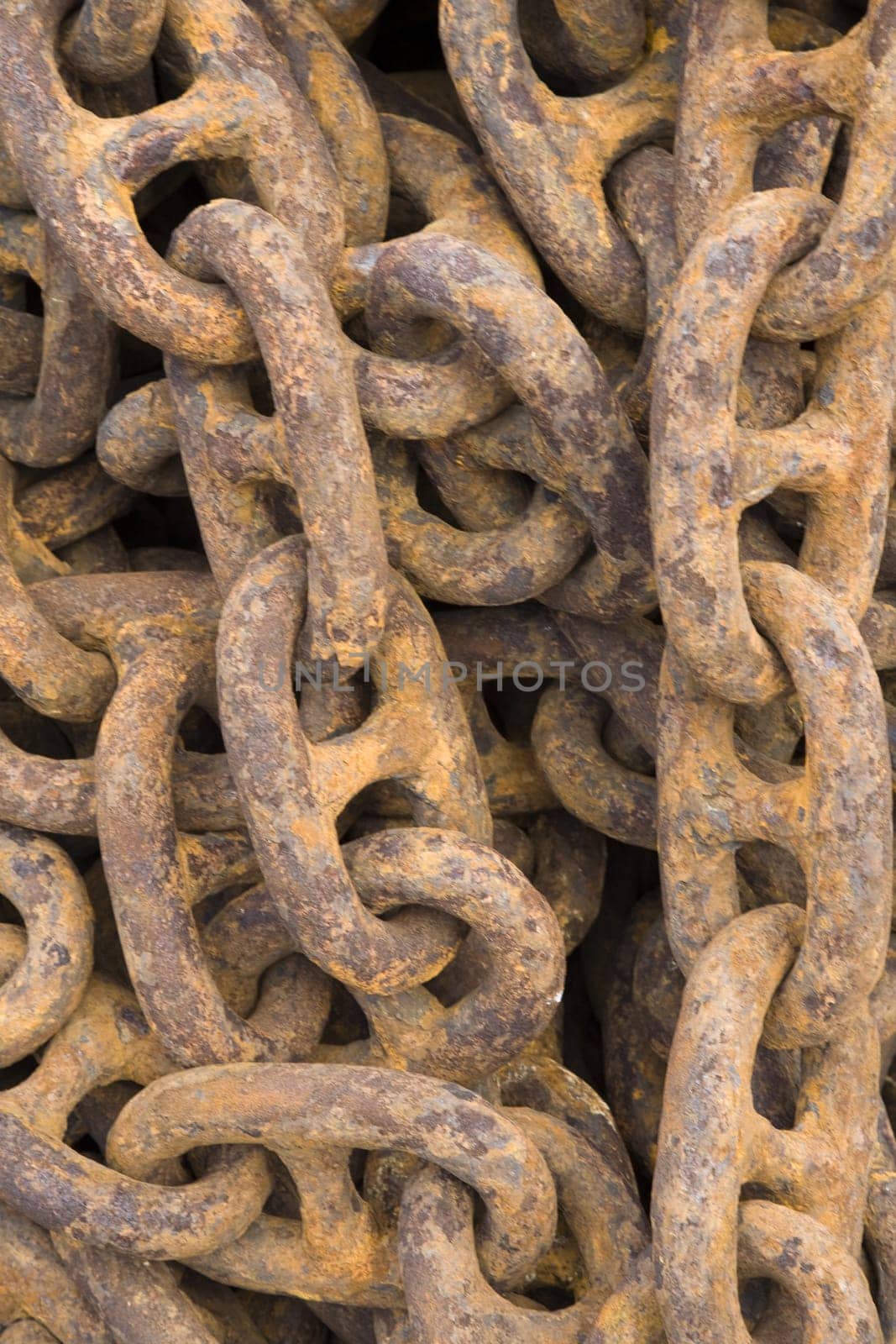 Rusty steel ship chains on a shipyard