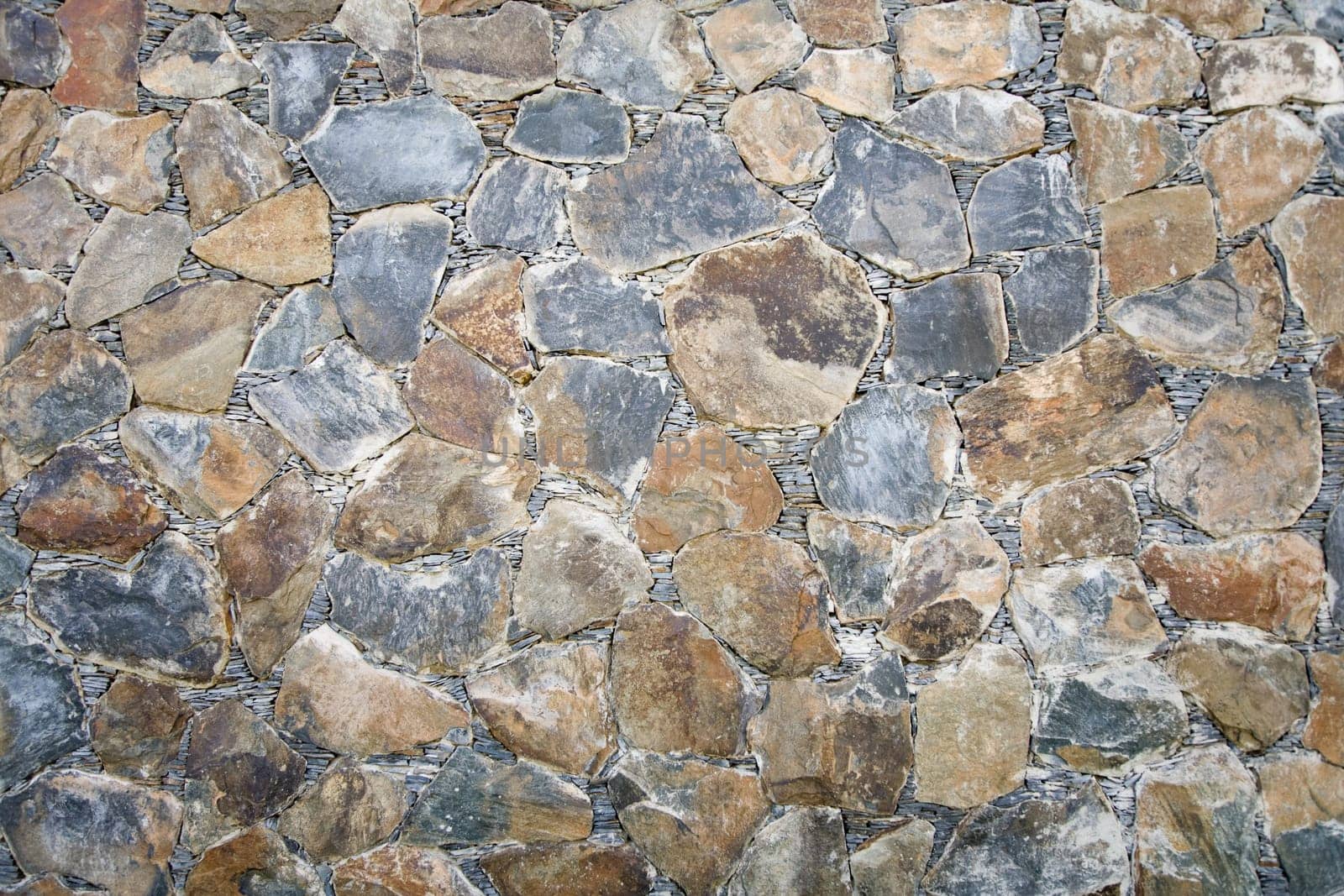 Close up image of a natural stone wall