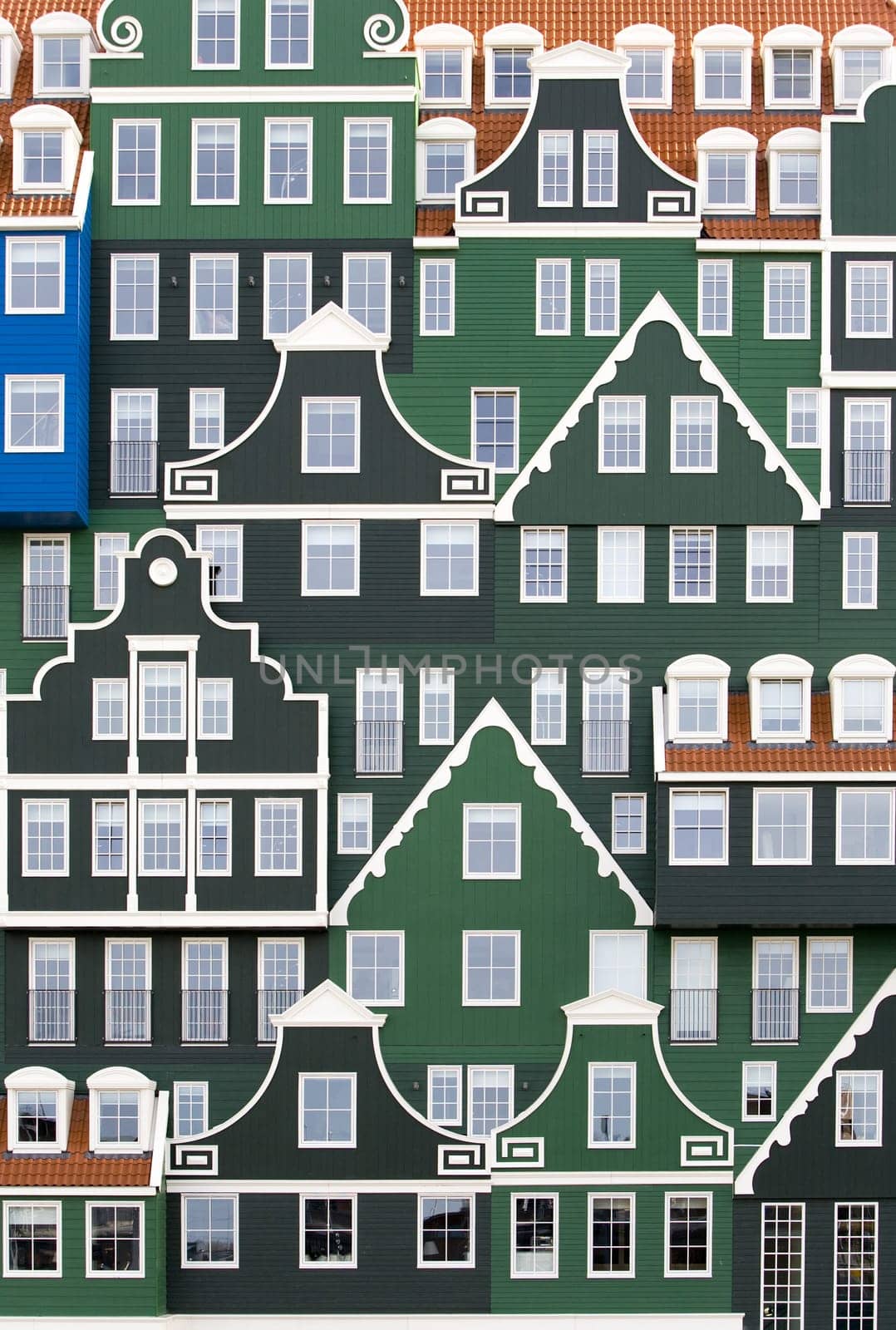 Square hotel-tower in local Zaanse architecture style
