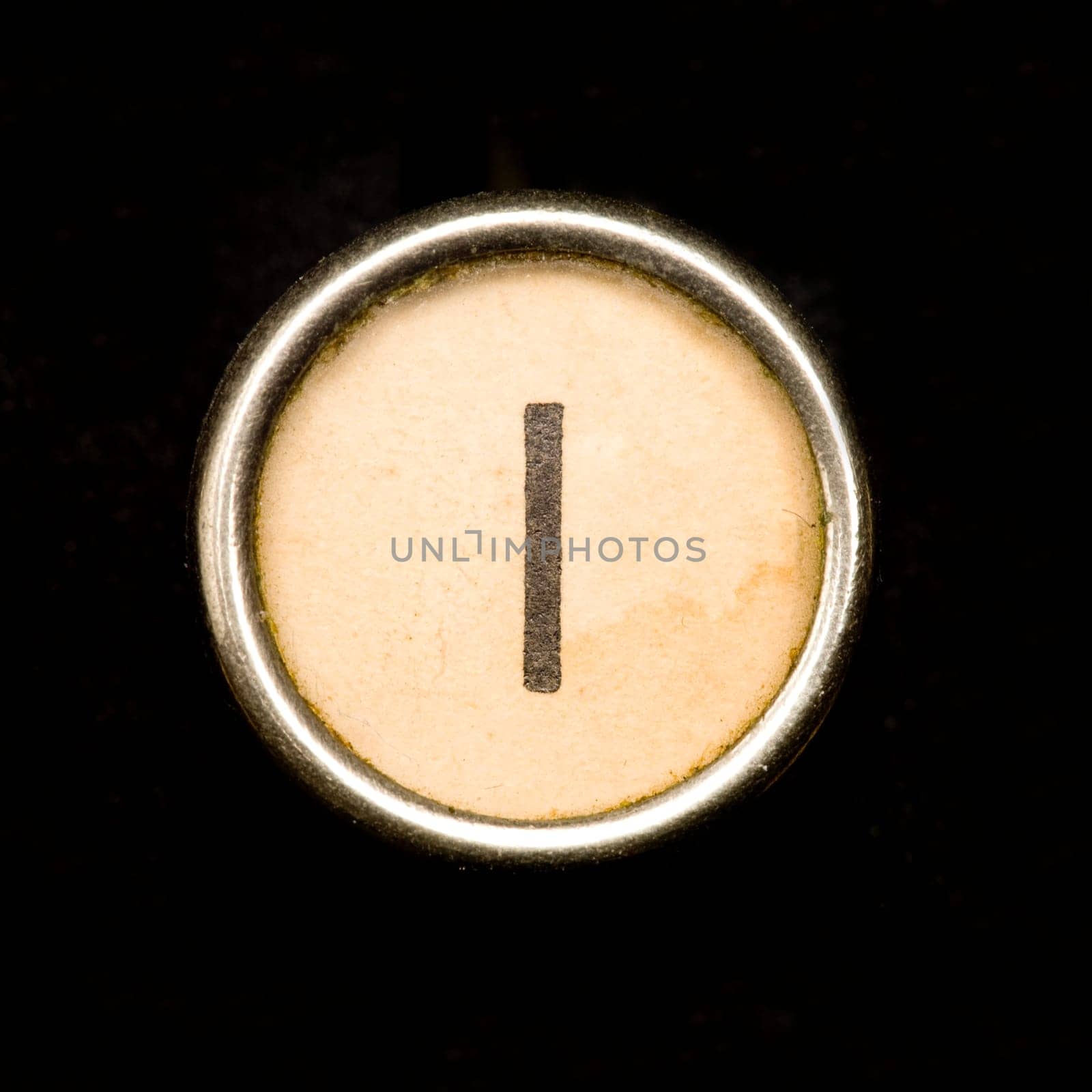 The I button on a complete alphabet of an antique typewriter