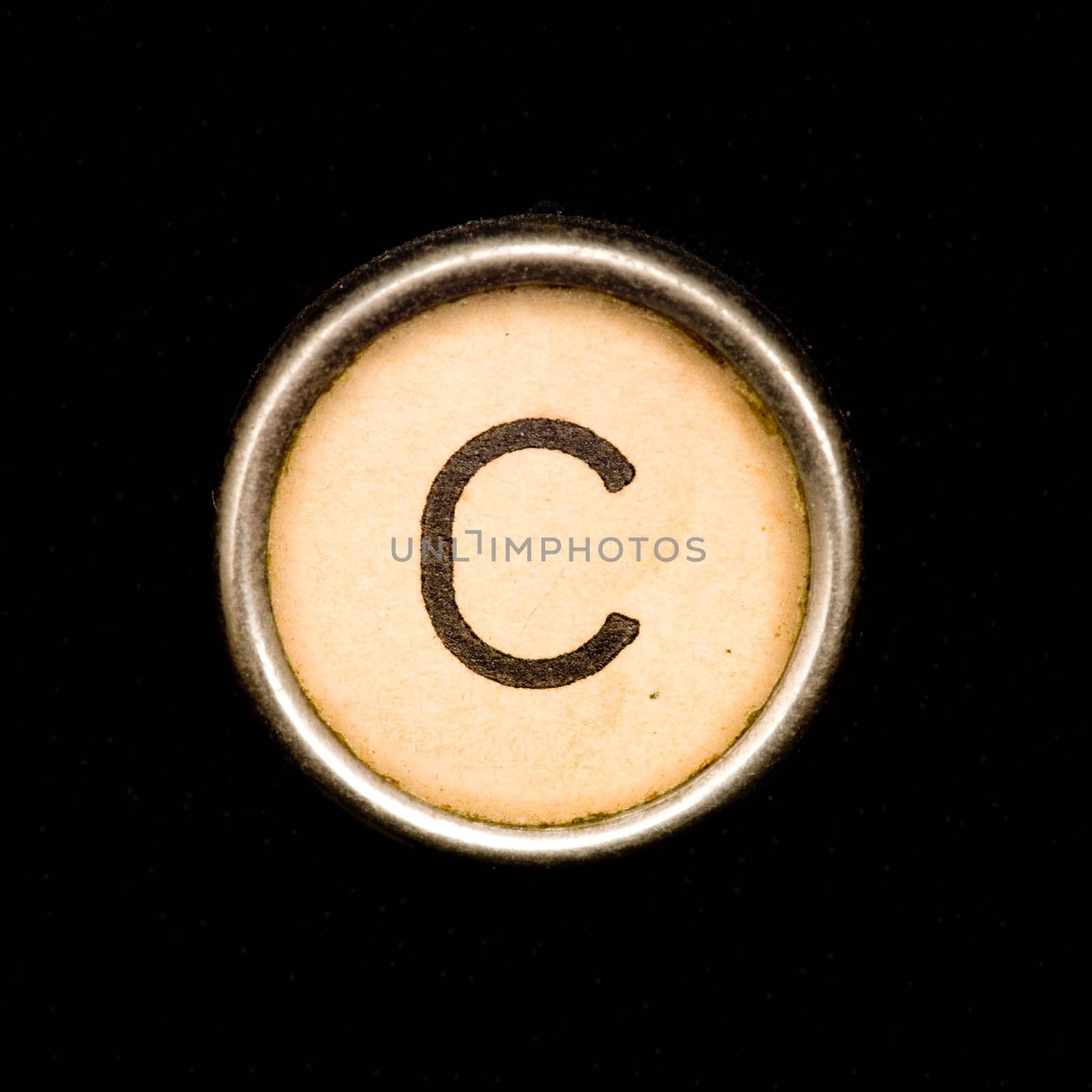 The C  button on a complete alphabet of an antique typewriter