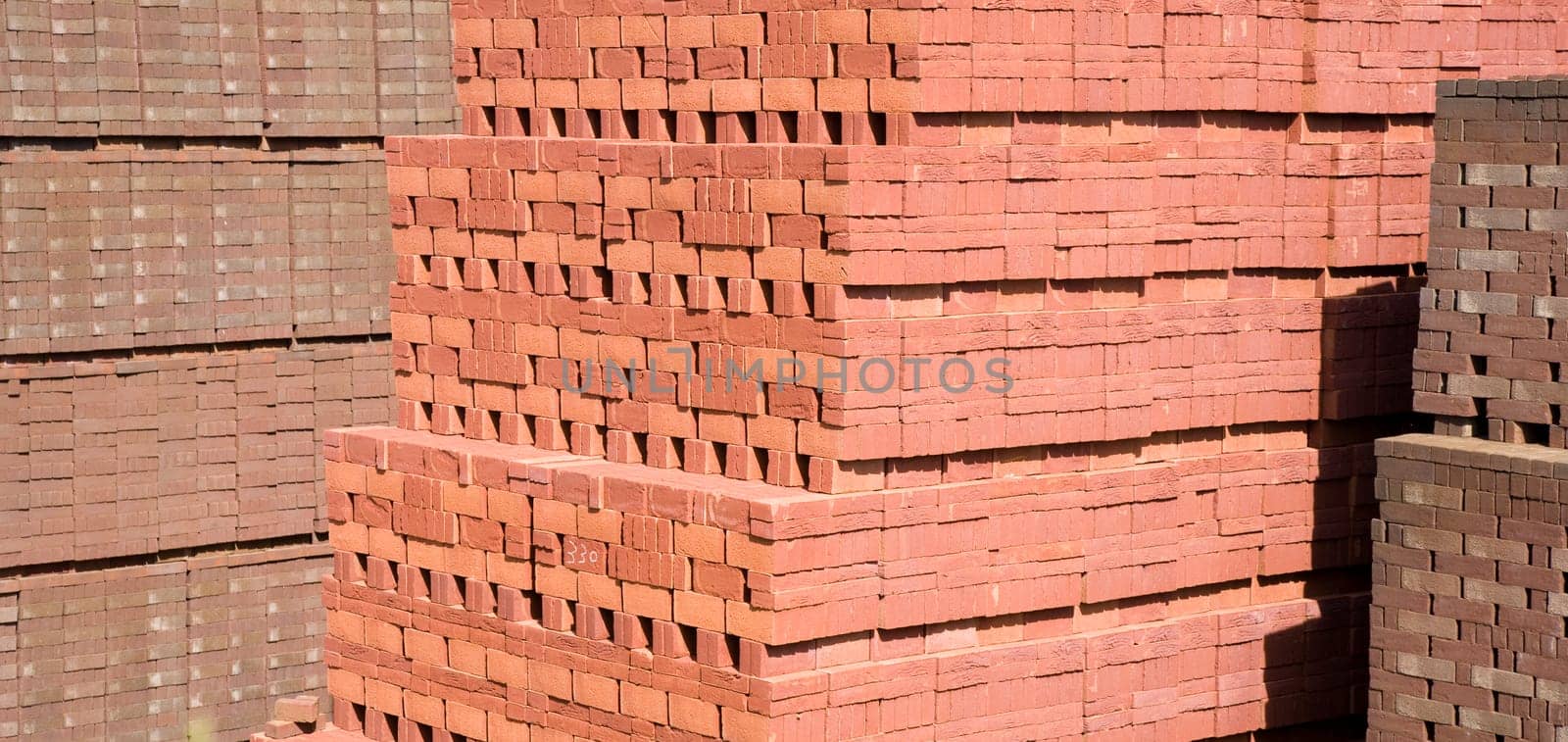 Stacked bricks at a brick factory