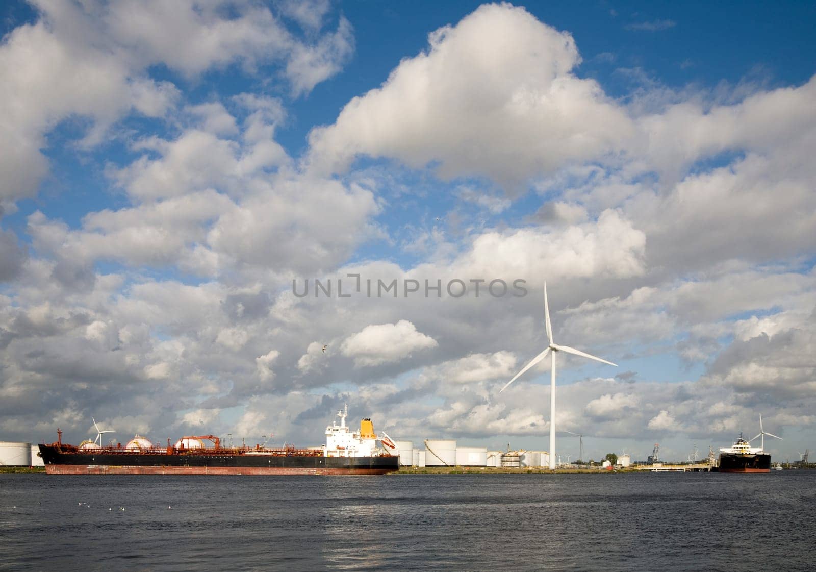Gas tanker and windturbine in the Port of Amsterdam