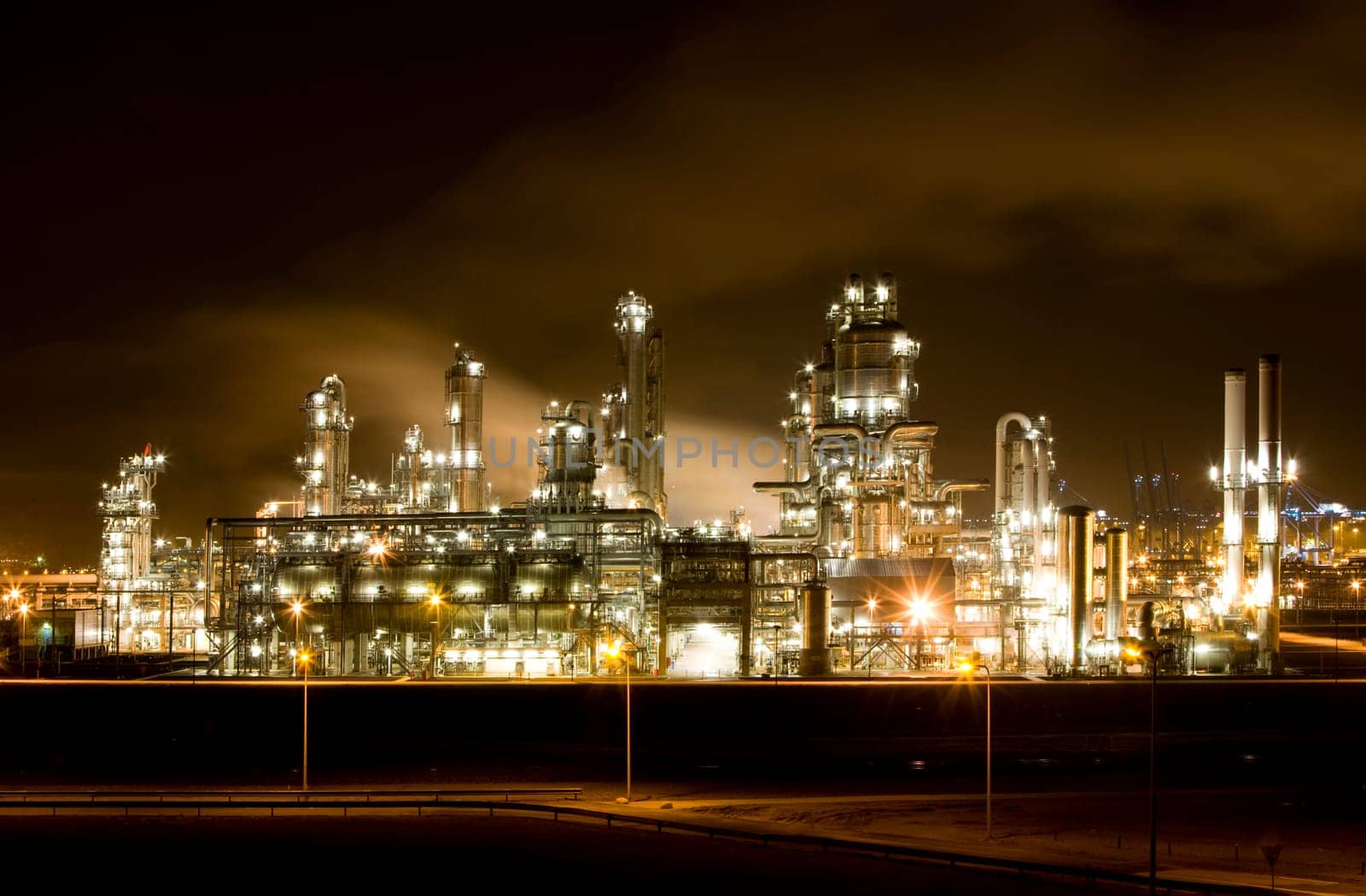 Refinery at night at Europoort, Rotterdam, Holland