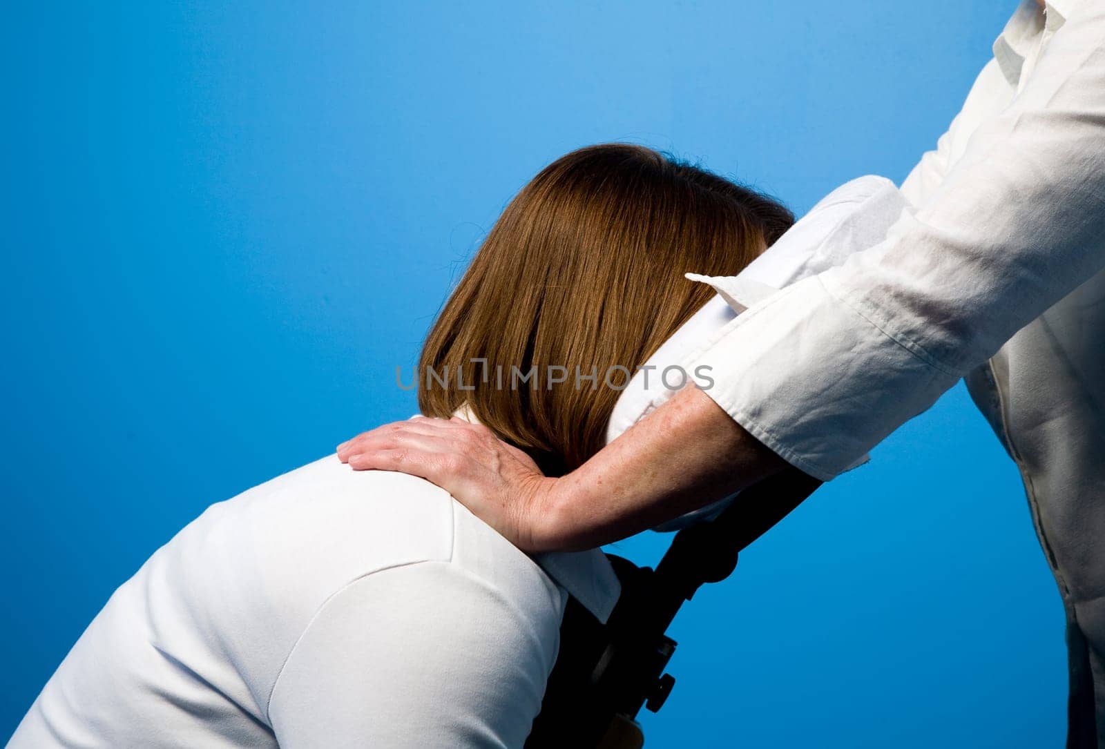 A woman getting a chair massage